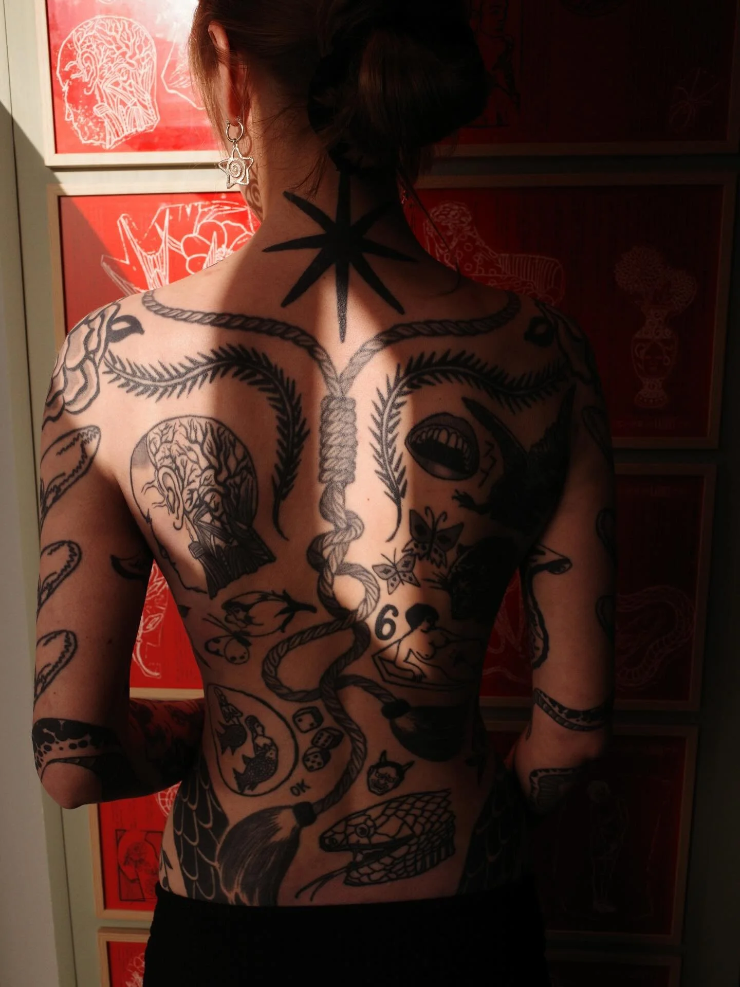 Franziska - All work by me since 2016. A few additions done earlier this month: flowers on her ribs (both sides) to frame the back, and a harpy on the back of her thigh, creeping from under one of the two huge black snakes we did on her legs in 2018-