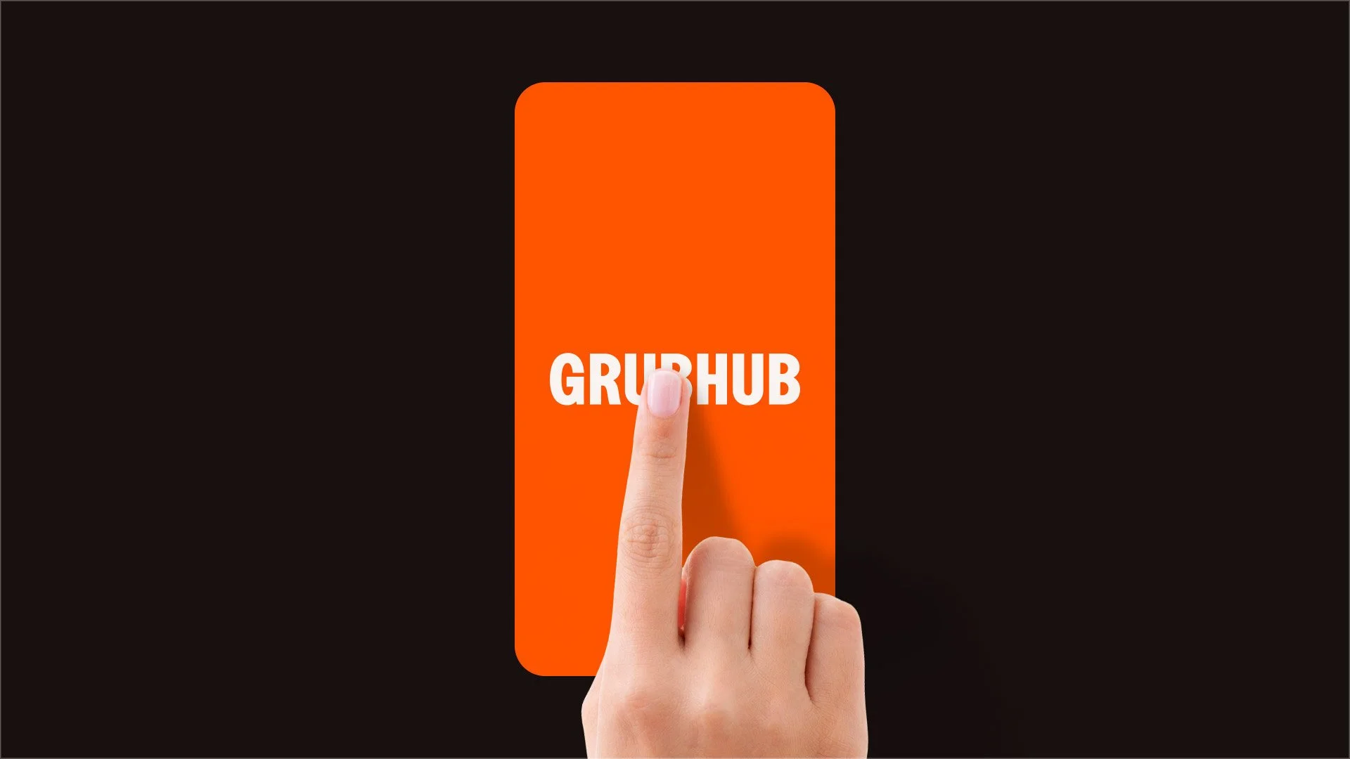 Close-up of a hand pressing the Grubhub app icon on a smartphone screen on a dark background.