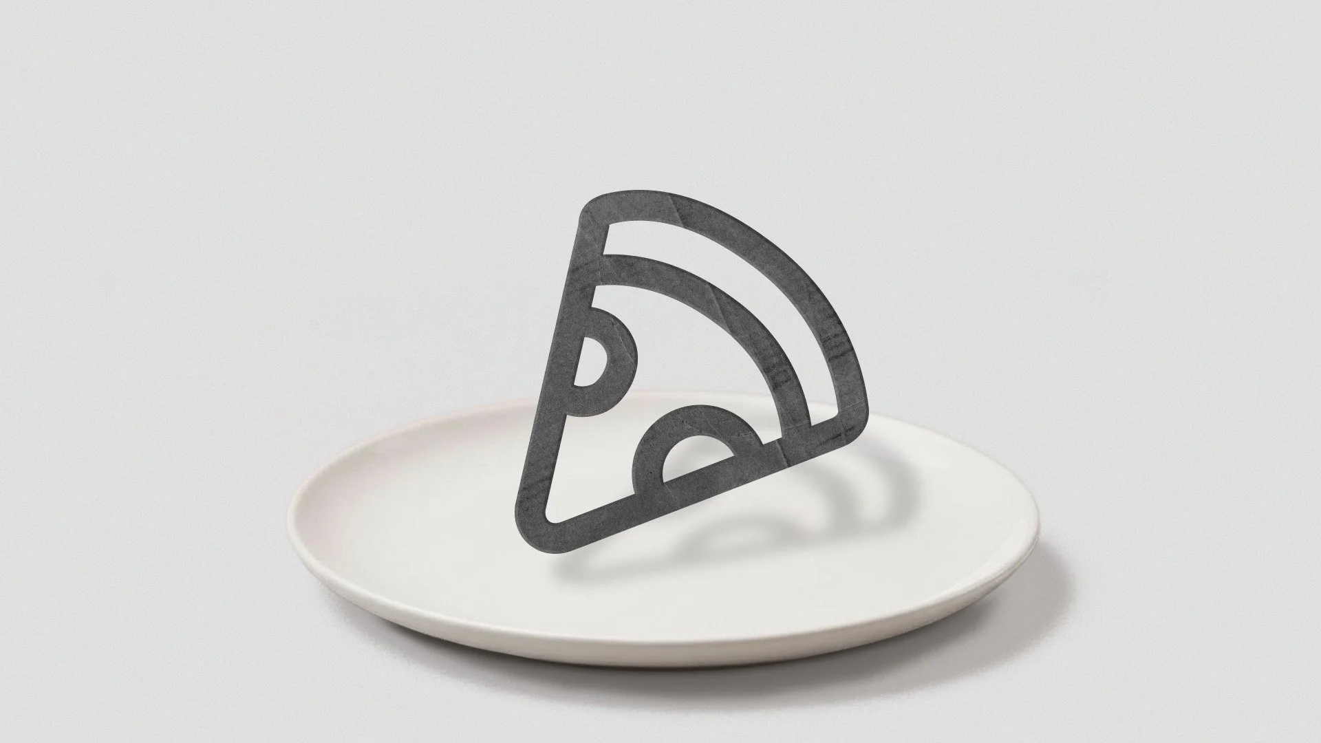 A white plate with a black cutout of a Wi-Fi signal icon standing upright on it.