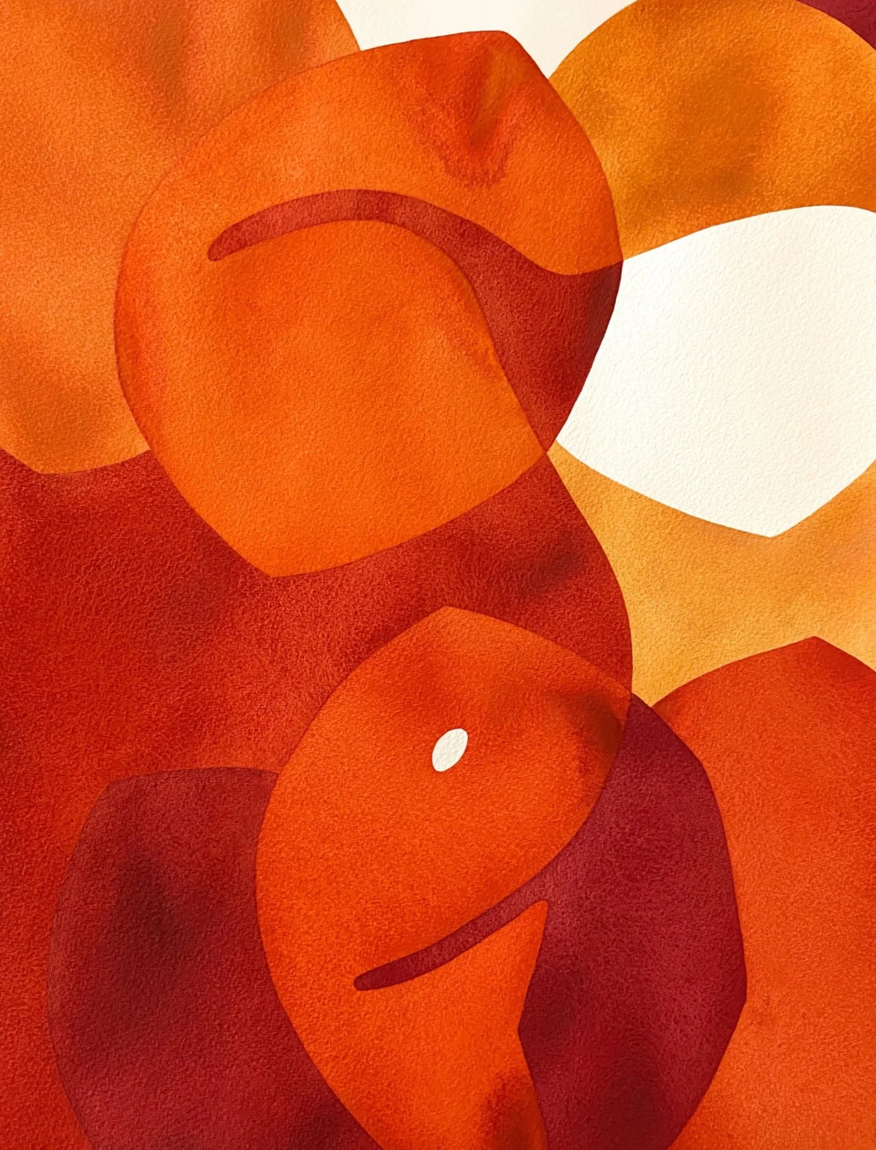 Une composition artistique de cercles et de formes géométriques en tons orange, rouge et blanc.