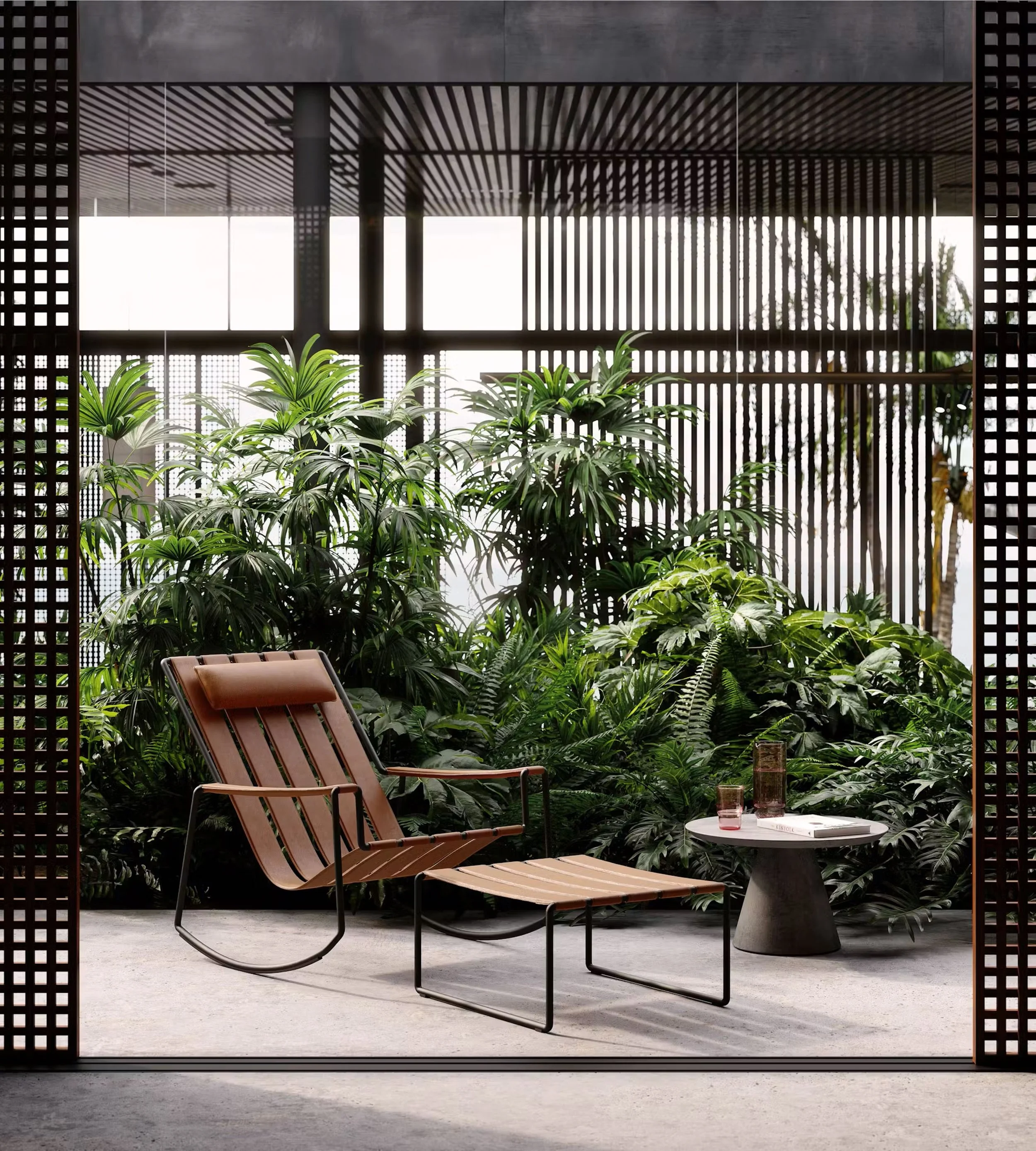 A modern indoor patio area with a lounge chair and a round table, surrounded by lush green plants and wooden lattice fencing, with large windows in the background allowing natural light to fill the space.