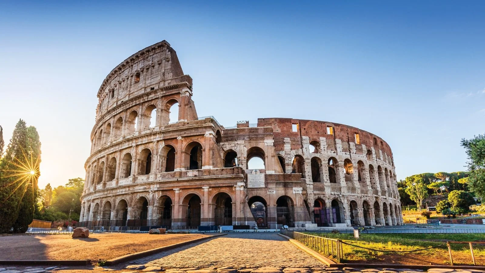 The Roman Colosseum at sunrise in Italy