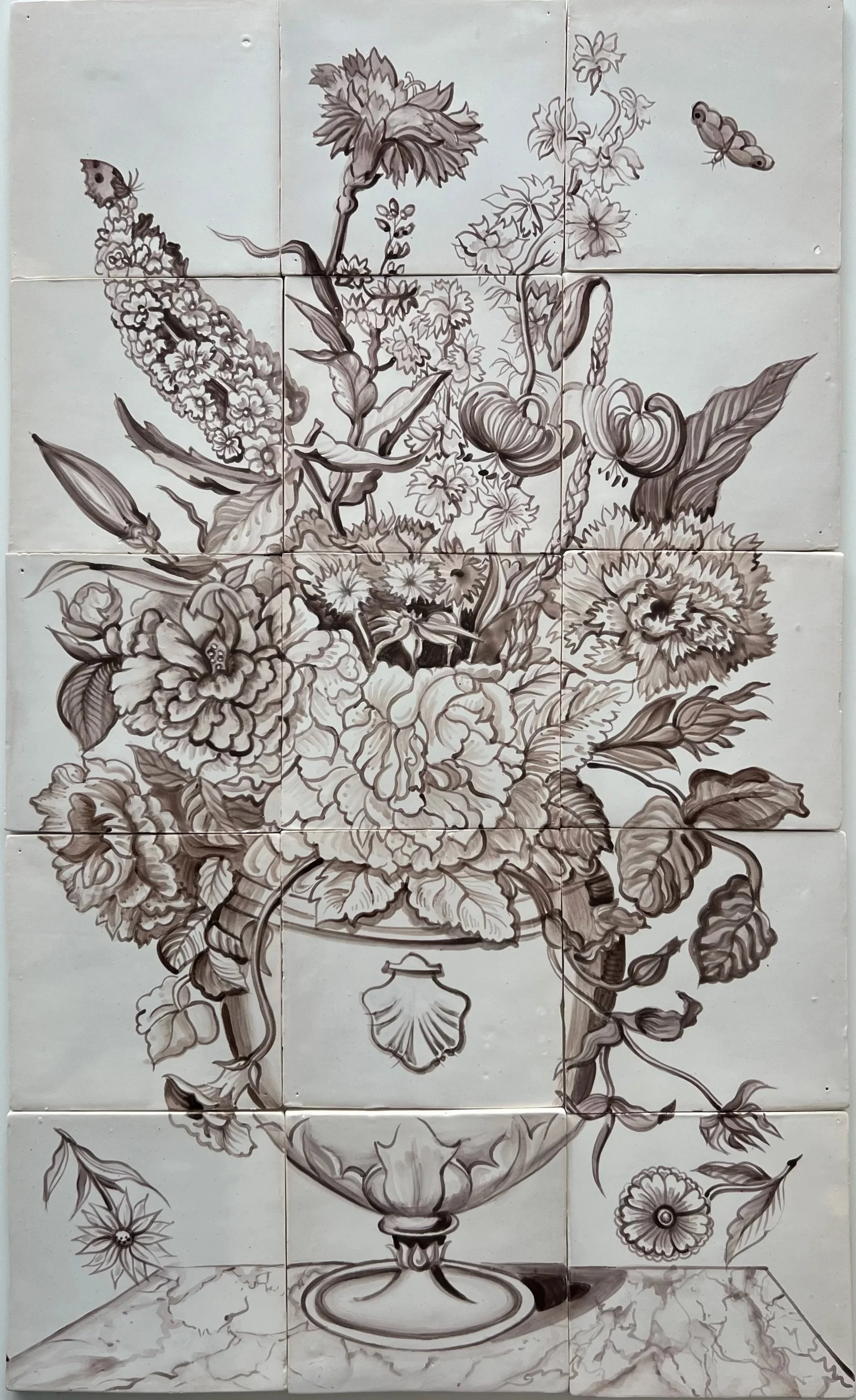 A black and white illustration of a large bouquet of flowers, including roses, and other blossoms, arranged in a decorative urn on a marble surface.