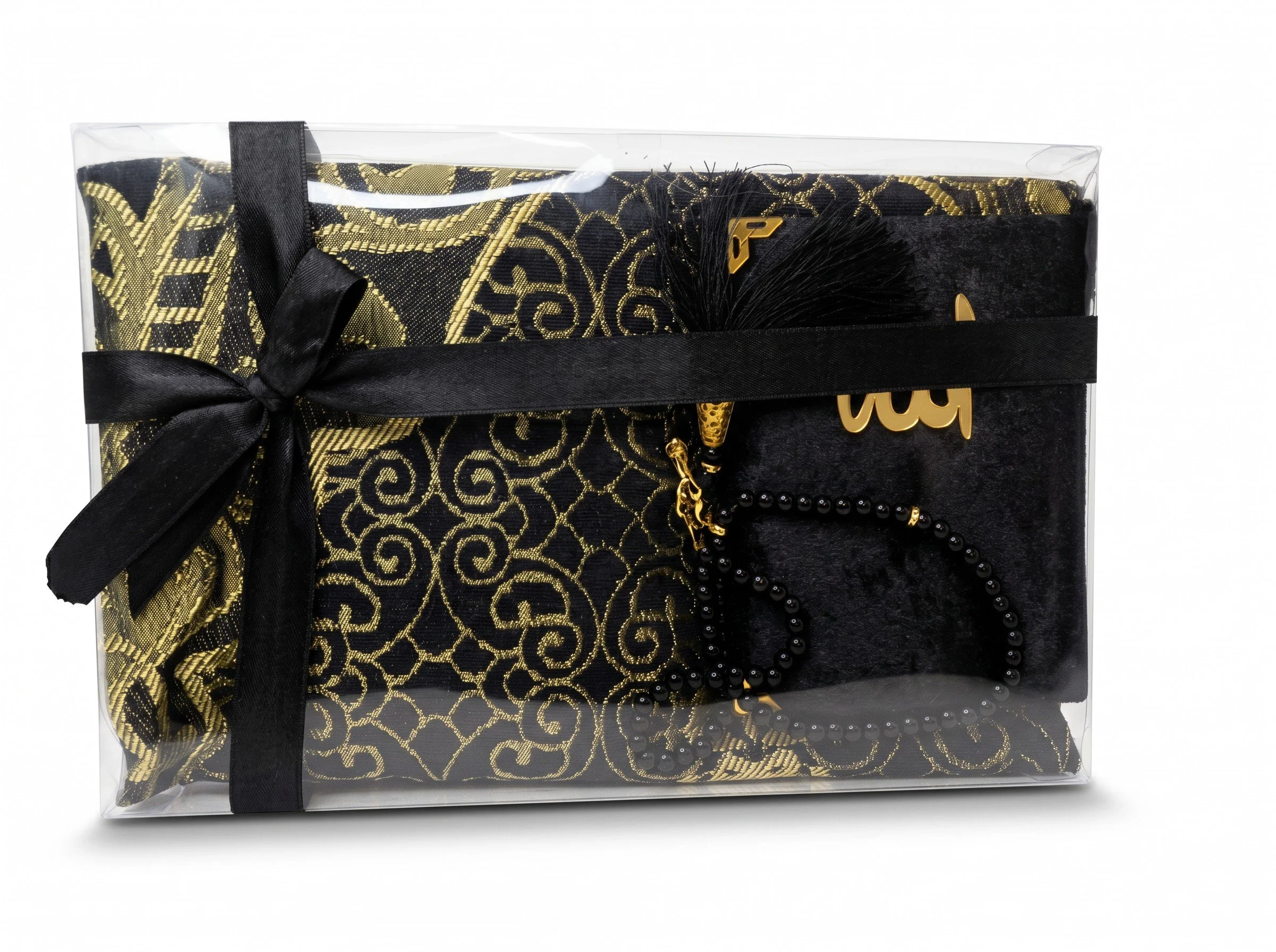 A decorative black and gold gift box wrapped with a black ribbon, containing a pair of black and gold earrings, a black beaded necklace, and a black and gold patterned cloth, all inside a transparent plastic box.