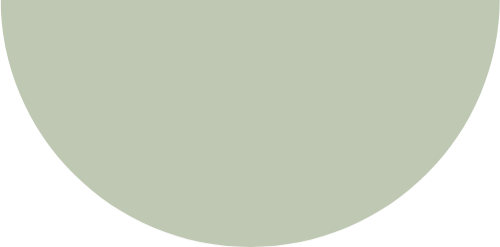 Close-up of a pale greenish-beige moon or planet surface.