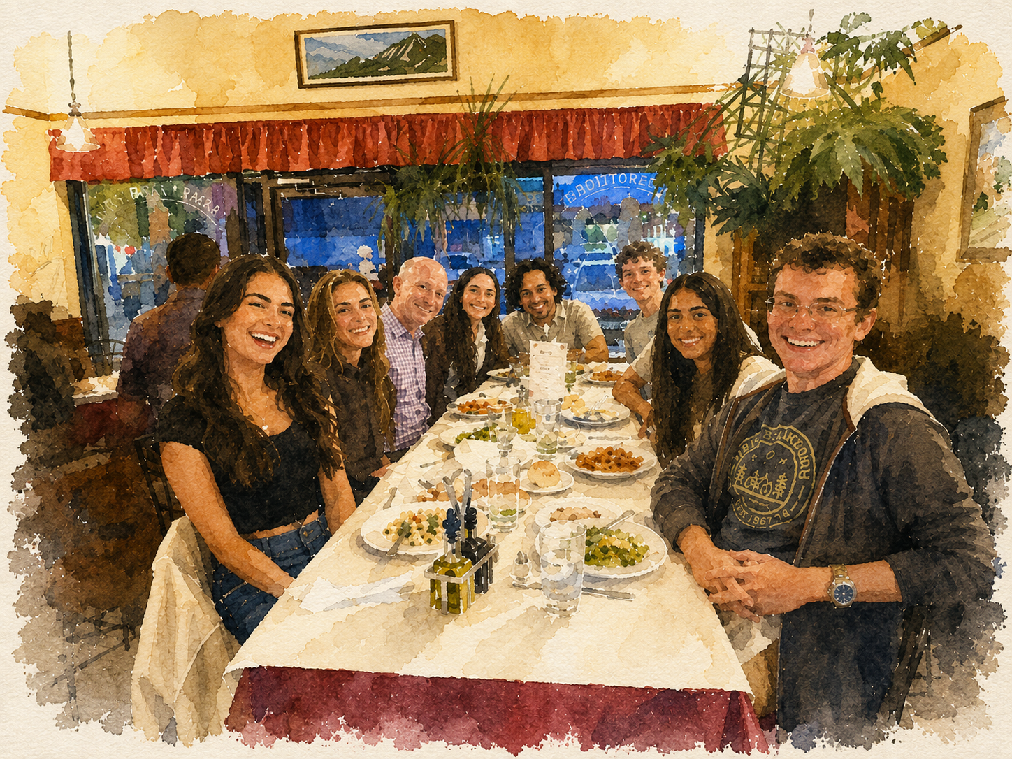 A group of eight people, diverse in gender and ethnicity, sitting at a long dining table with plates of food, drinks, and utensils, smiling happily in a restaurant. Ford Presidential Scholarship Fund