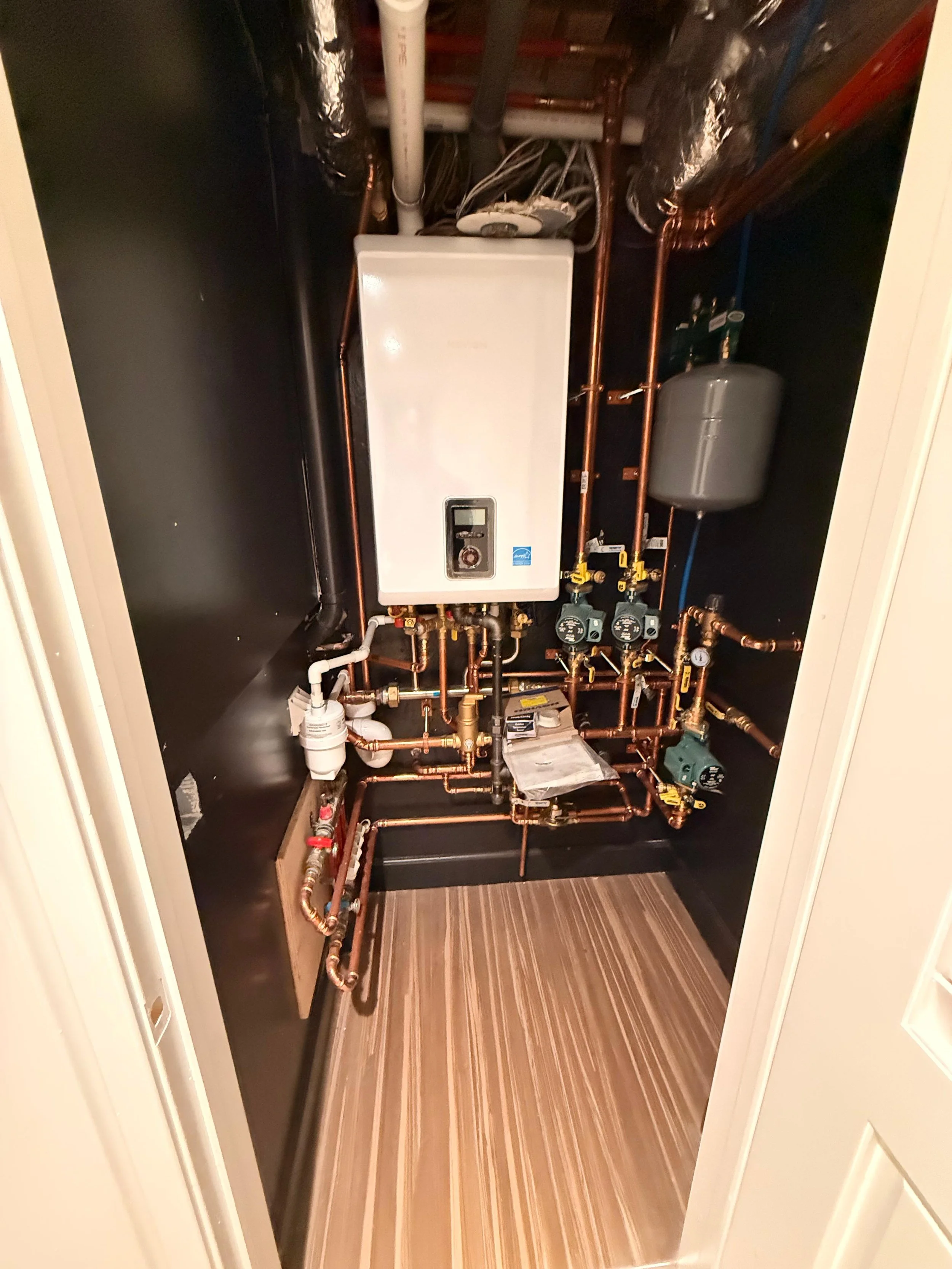 New tankless combi-boiler system installed
