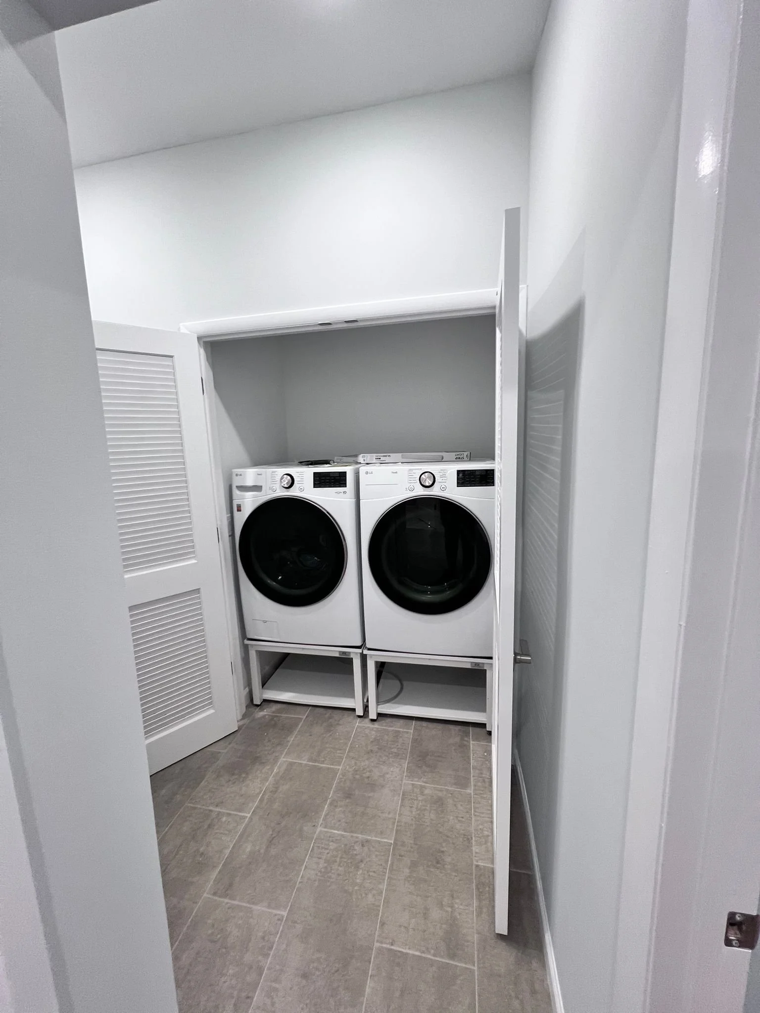 New laundry room with new doors and flooring