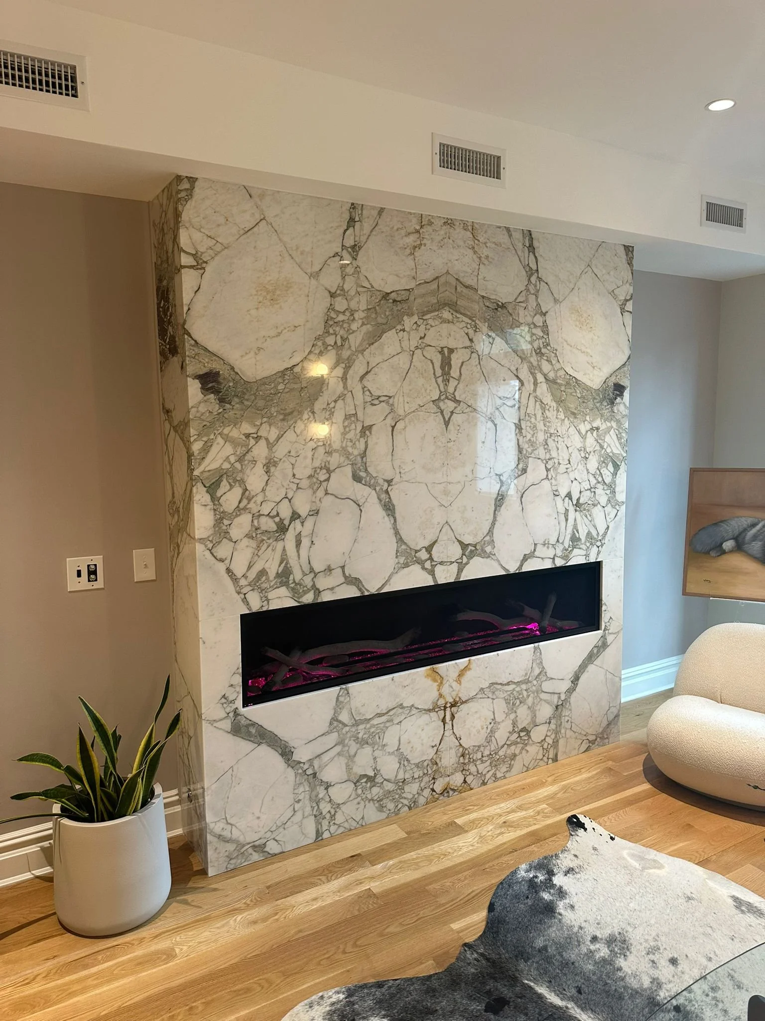 Gas fireplace with marble front