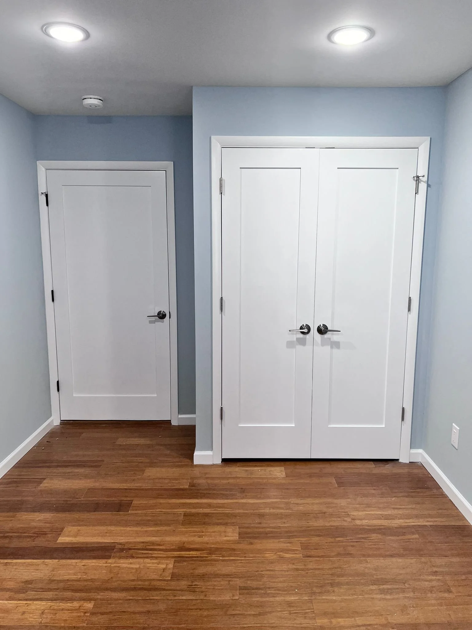 New doors, lights, mouldings, flooring and trims