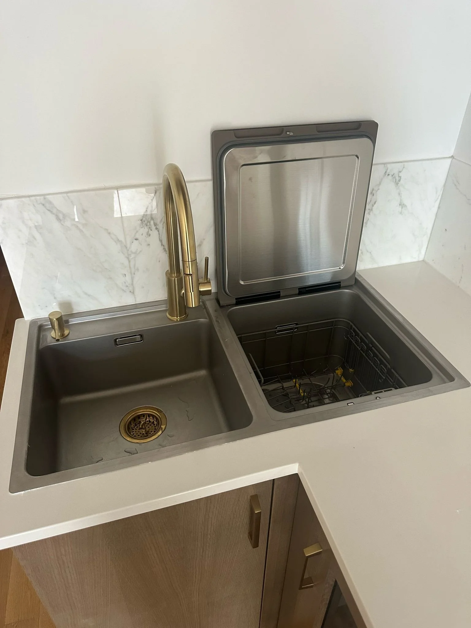 New sink/dishwasher combo in wet bar