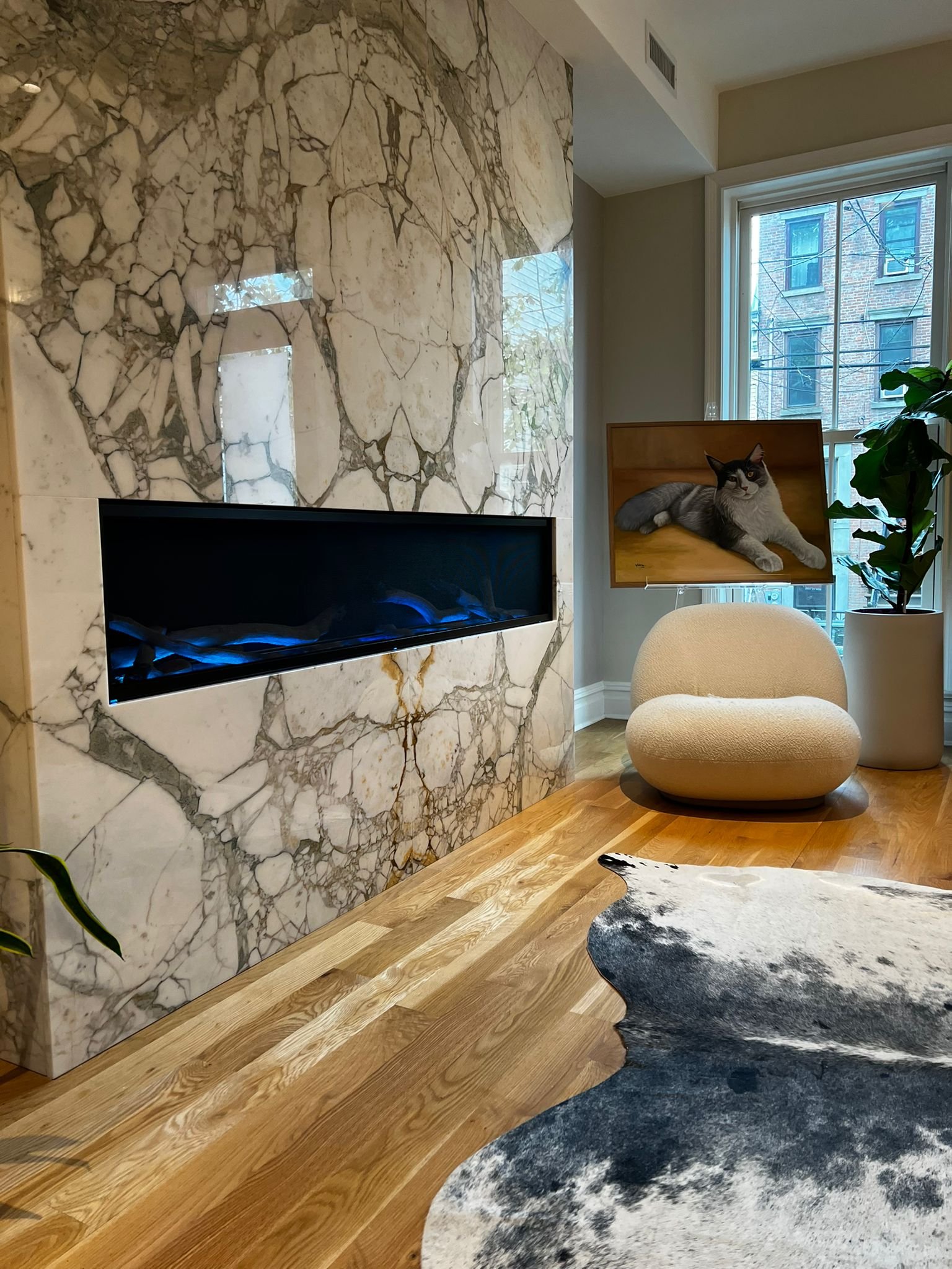 Gas fireplace with marble front