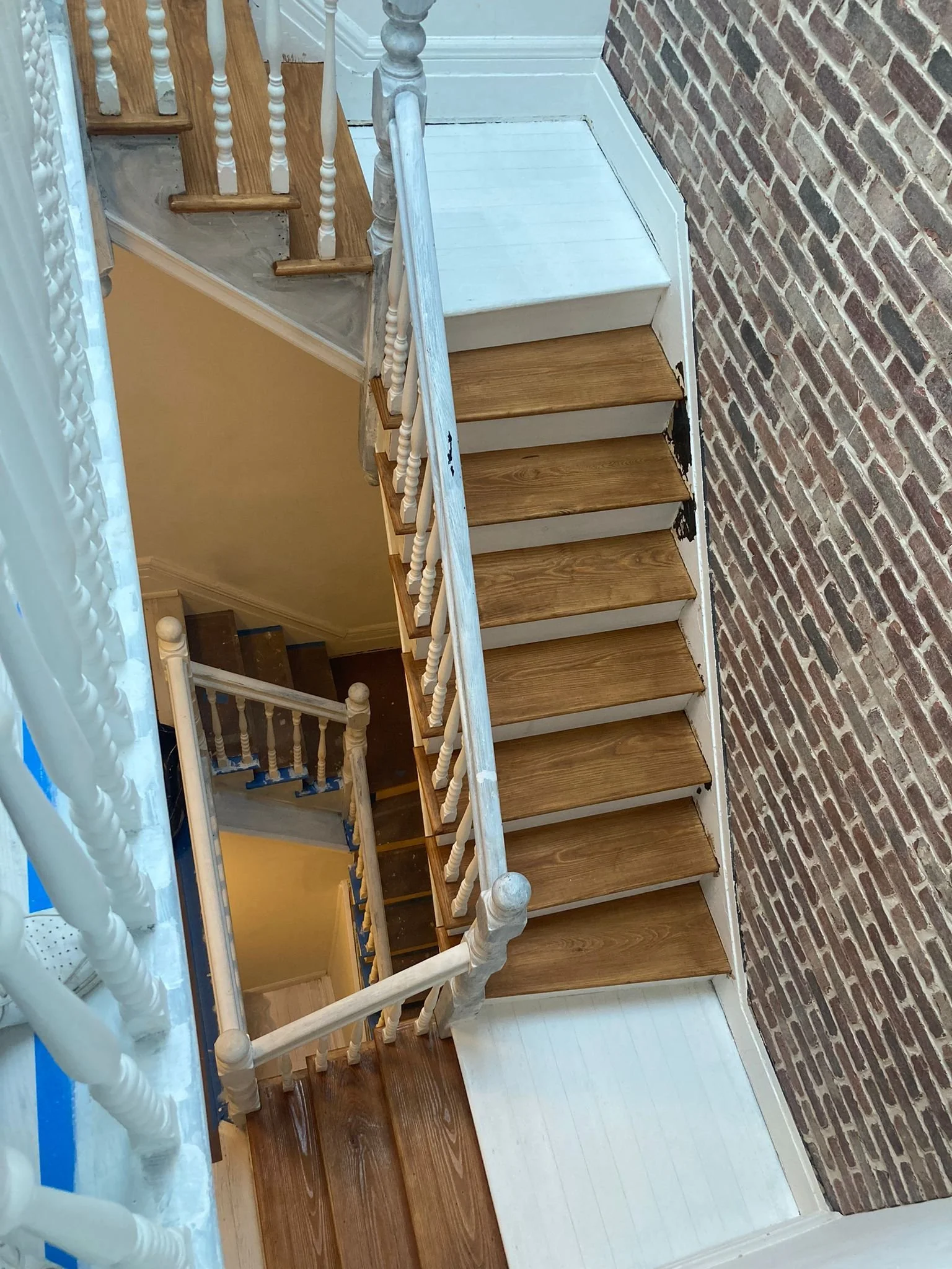 Brick veneer installation to stair wall