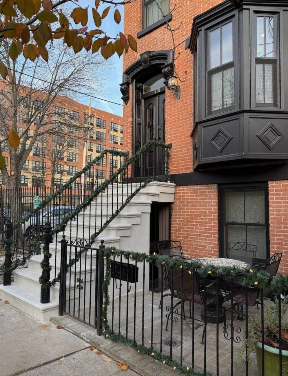 Historic door and bay window replacement with restoration of all original mouldings/trim work