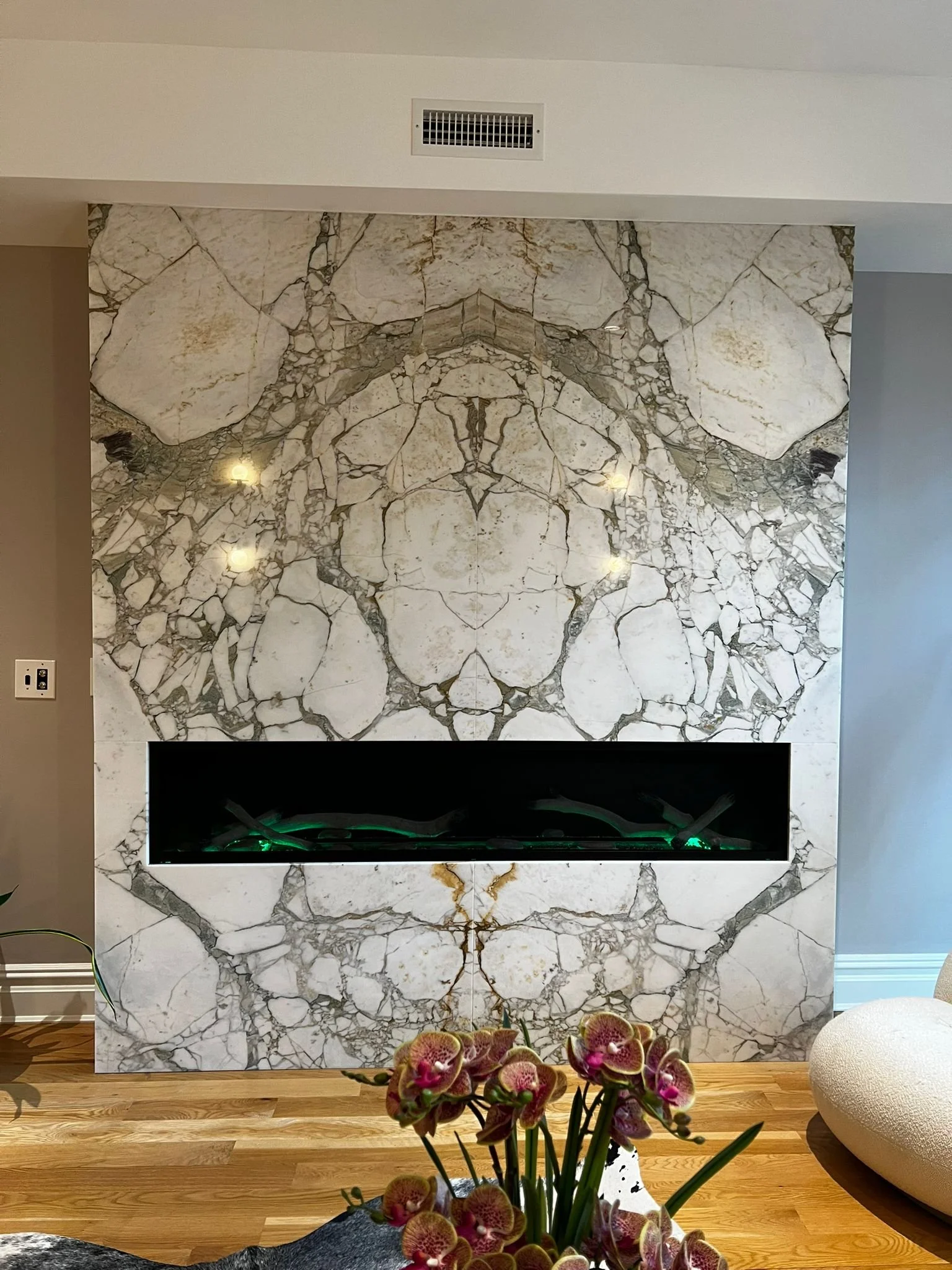 Gas fireplace with marble front