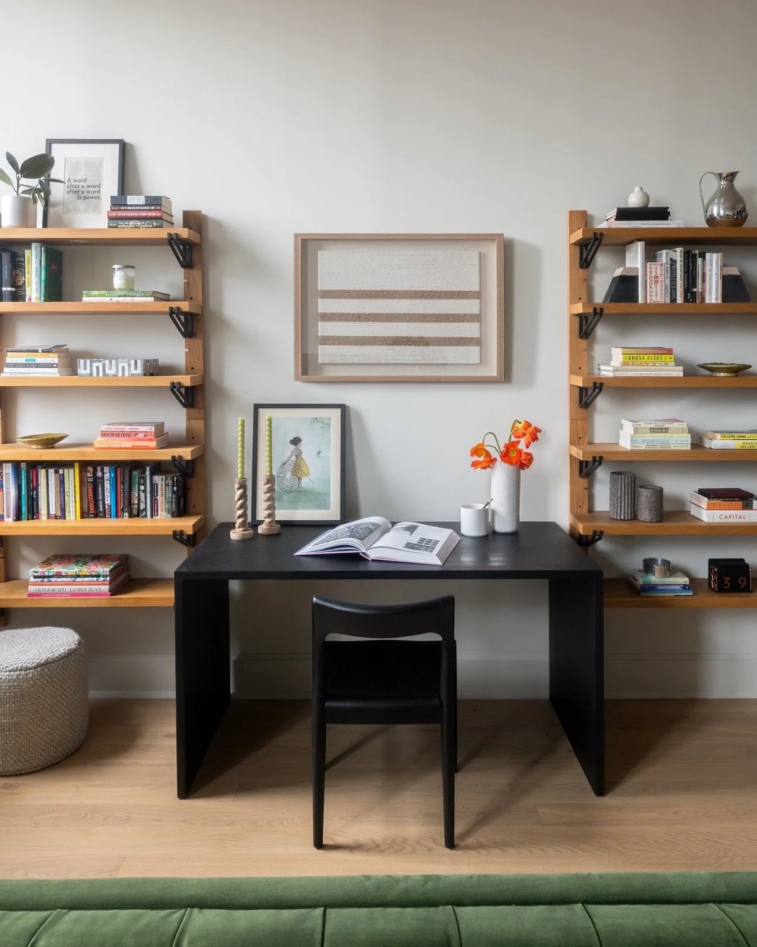 When working from home, a dedicated space makes all the difference for focus and creativity.

This office pairs a simple desk with custom millwork, thoughtfully styled with our client&rsquo;s favorite books and collected pieces. 

Design: @hco_interi