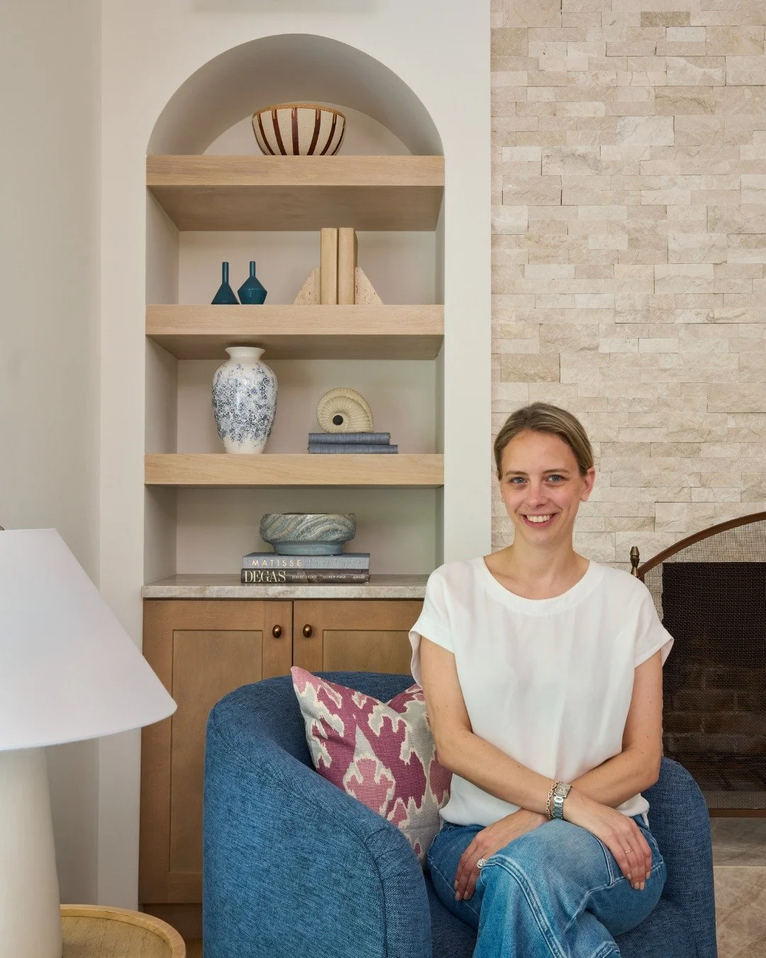 Hillary on-site at one of our latest projects. 📸 We love how the soaring ceilings, custom millwork, and soft furnishings came together to give this living room a fresh, inviting feel.

Design: @hco_interiors 
Photography: @bartholomew.studio
