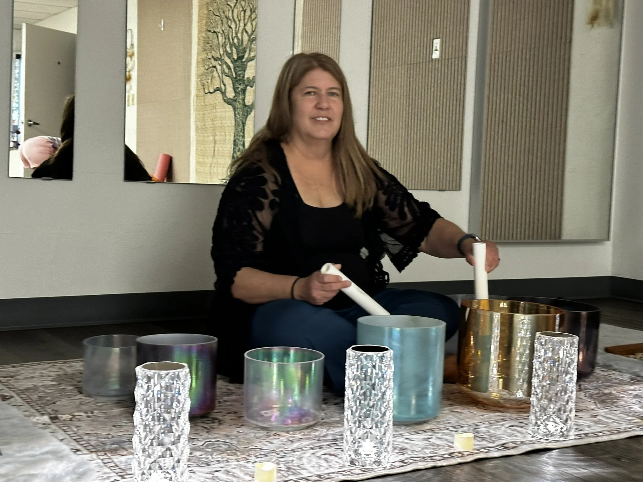 Crystal singing bowls arranged for a Serenity Waves sound journey in Arizona