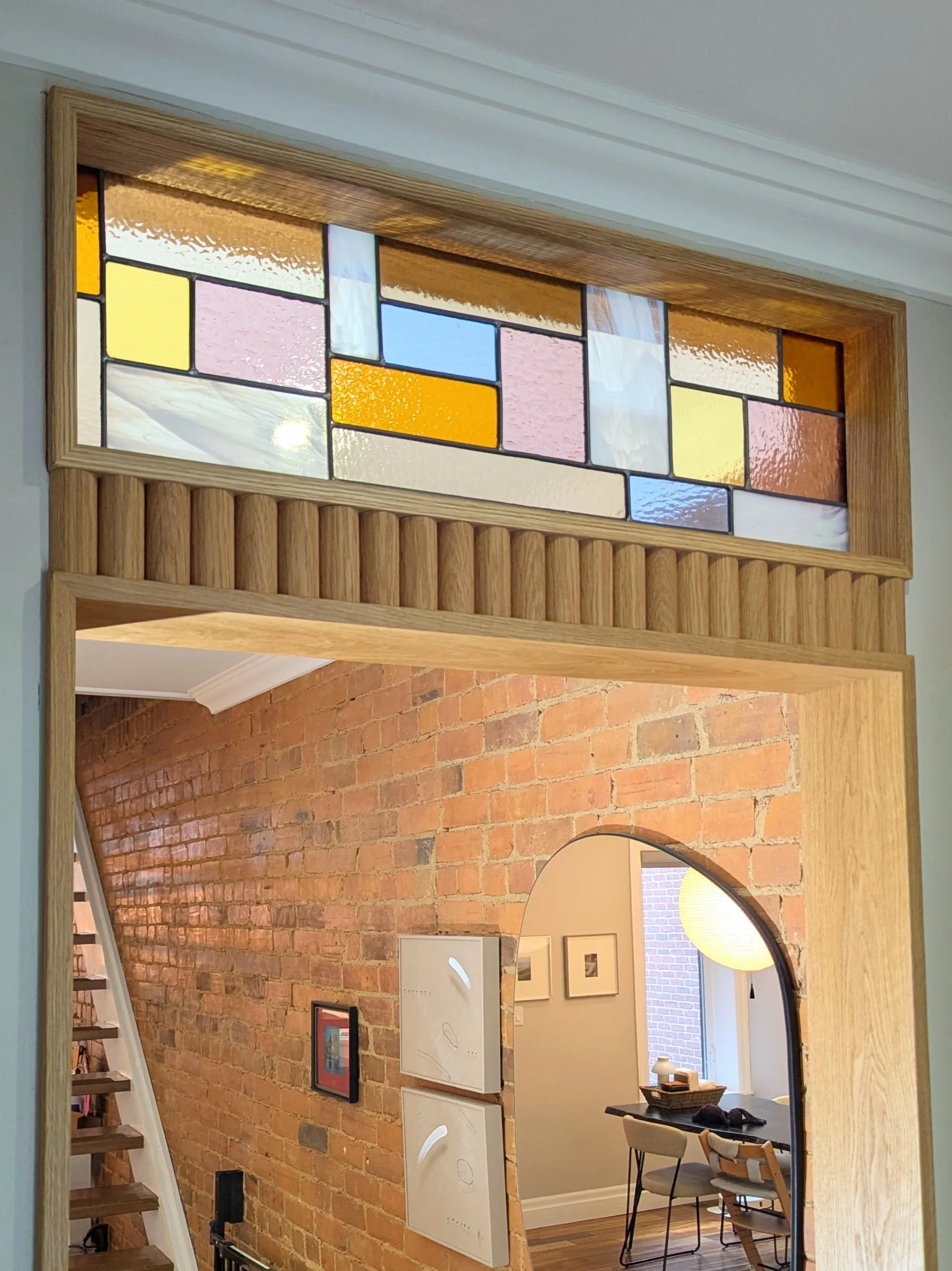 Custom door and window jamb with transom window. 