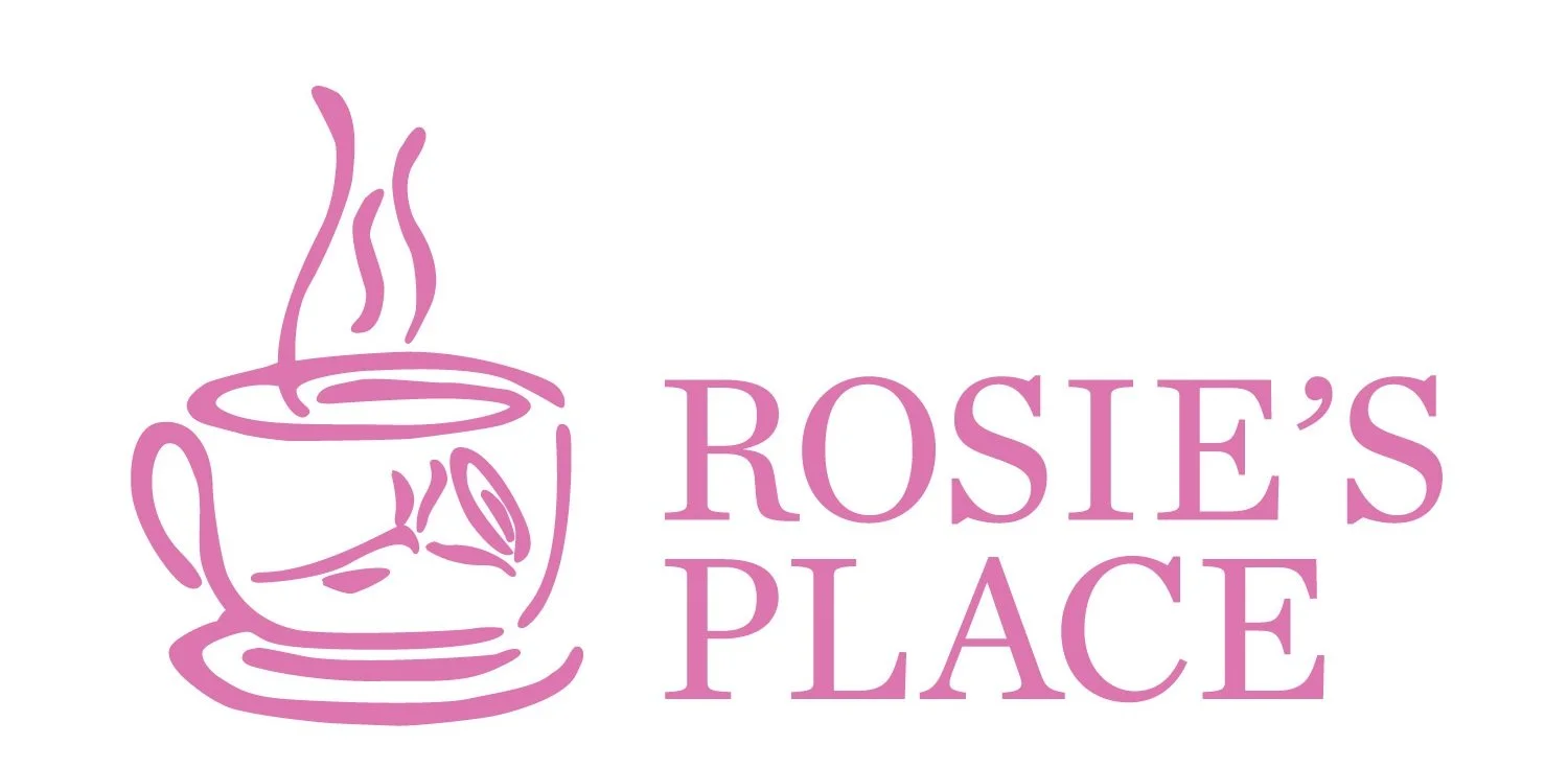 A logo with a pink outline of a steaming cup of coffee or tea and the words "Rosie's Place" written to the right in pink.