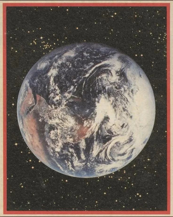 An illustration of Earth surrounded by a starry space background, with a red border.