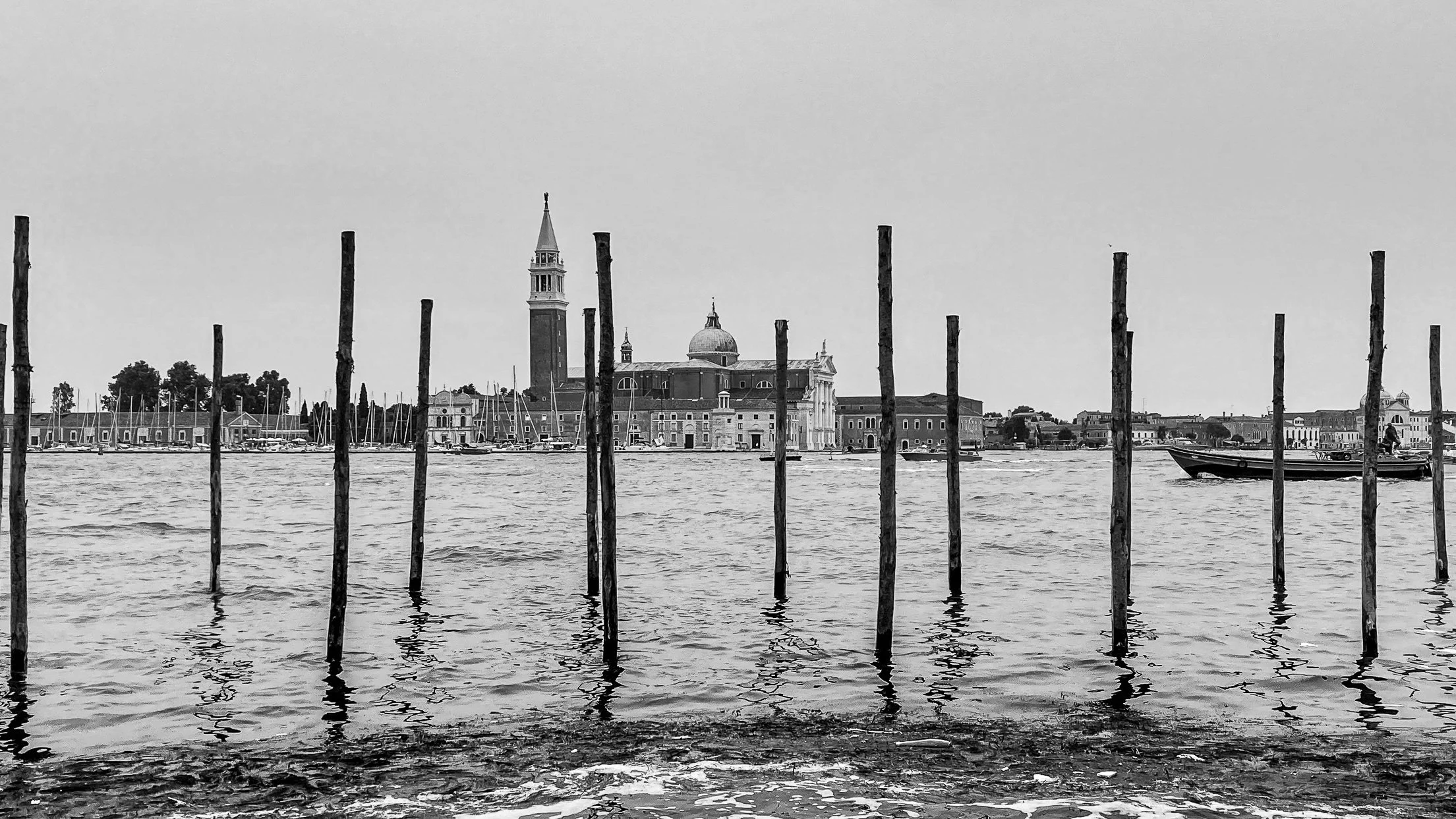 San Giorgio Maggiore through the gondola mooring poles in the bacino, Venice