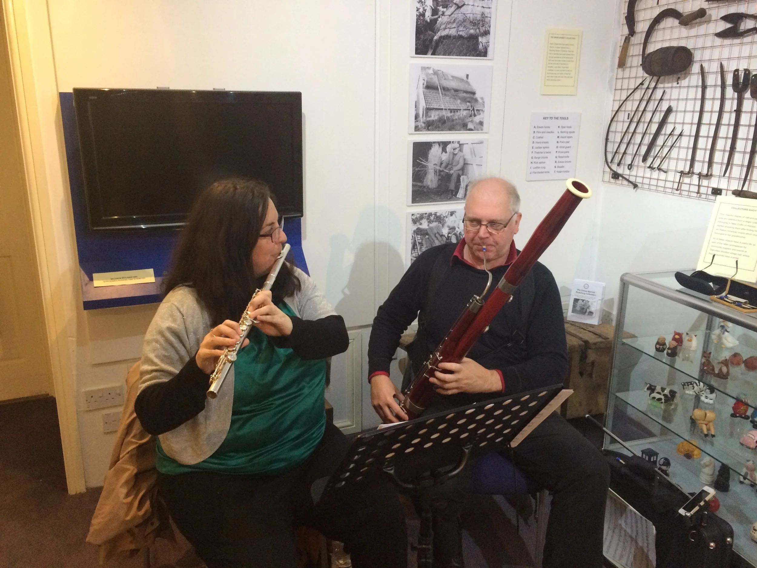Katy playing flute and Miles playing bassoon in Sherborne Museum