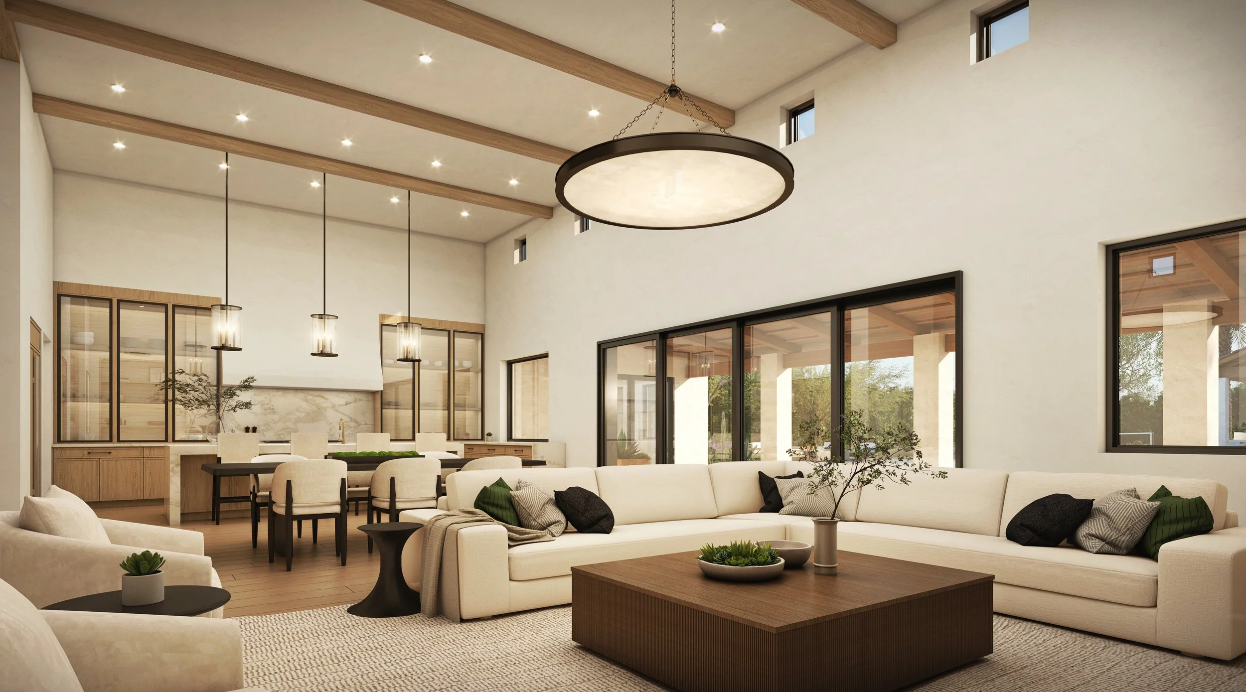 Modern living room with white sectional sofa, black and green accent pillows, wooden coffee table, potted plants, large windows, and high vaulted ceiling with wooden beams and hanging light fixtures.