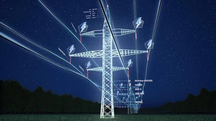 Night sky with starry background showing a large electrical transmission tower with multiple insulators and lightning bolt symbols, indicating high-voltage power lines.
