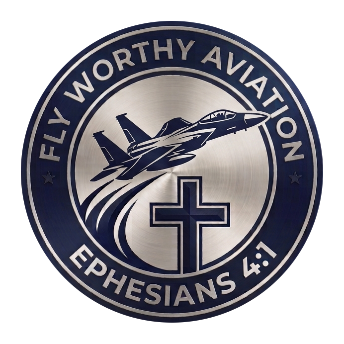 A circular emblem featuring a fighter jet flying above a cross, with the text 'Fly Worthy Aviation' at the top and 'Ephesians 4:1' at the bottom.