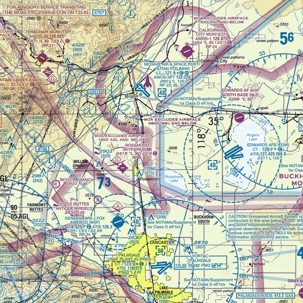 A detailed sectional aviation chart showing airspace boundaries, navigation aids, airports such as Edwards Air Force Base and Palmdale, restricted areas, and flight instructions, with various symbols, lines, and labels indicating navigational and regulatory information.