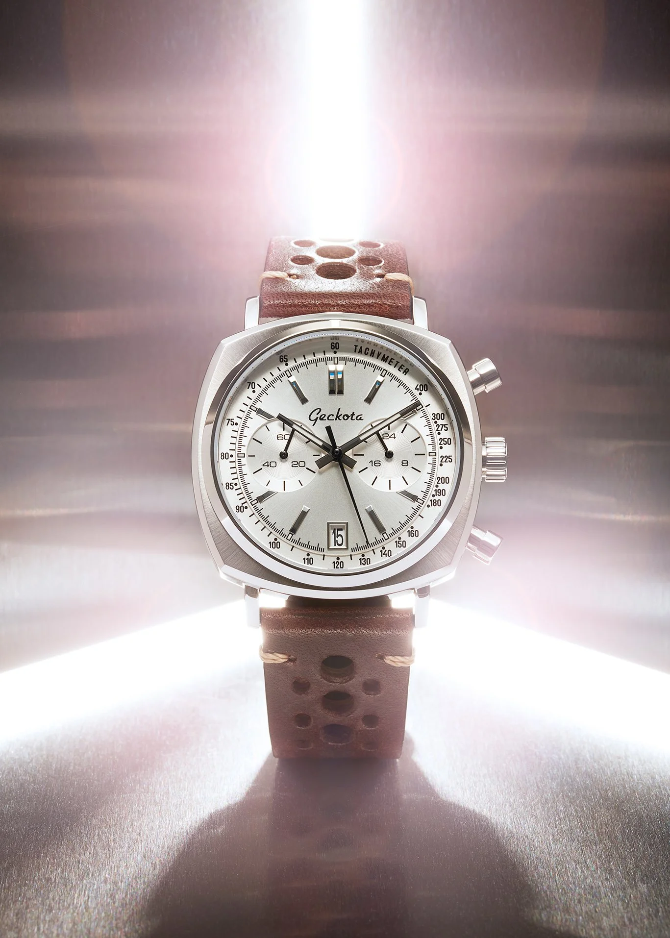 Geckota Classic Chronotimer chronograph watch with stainless steel  background and light flare