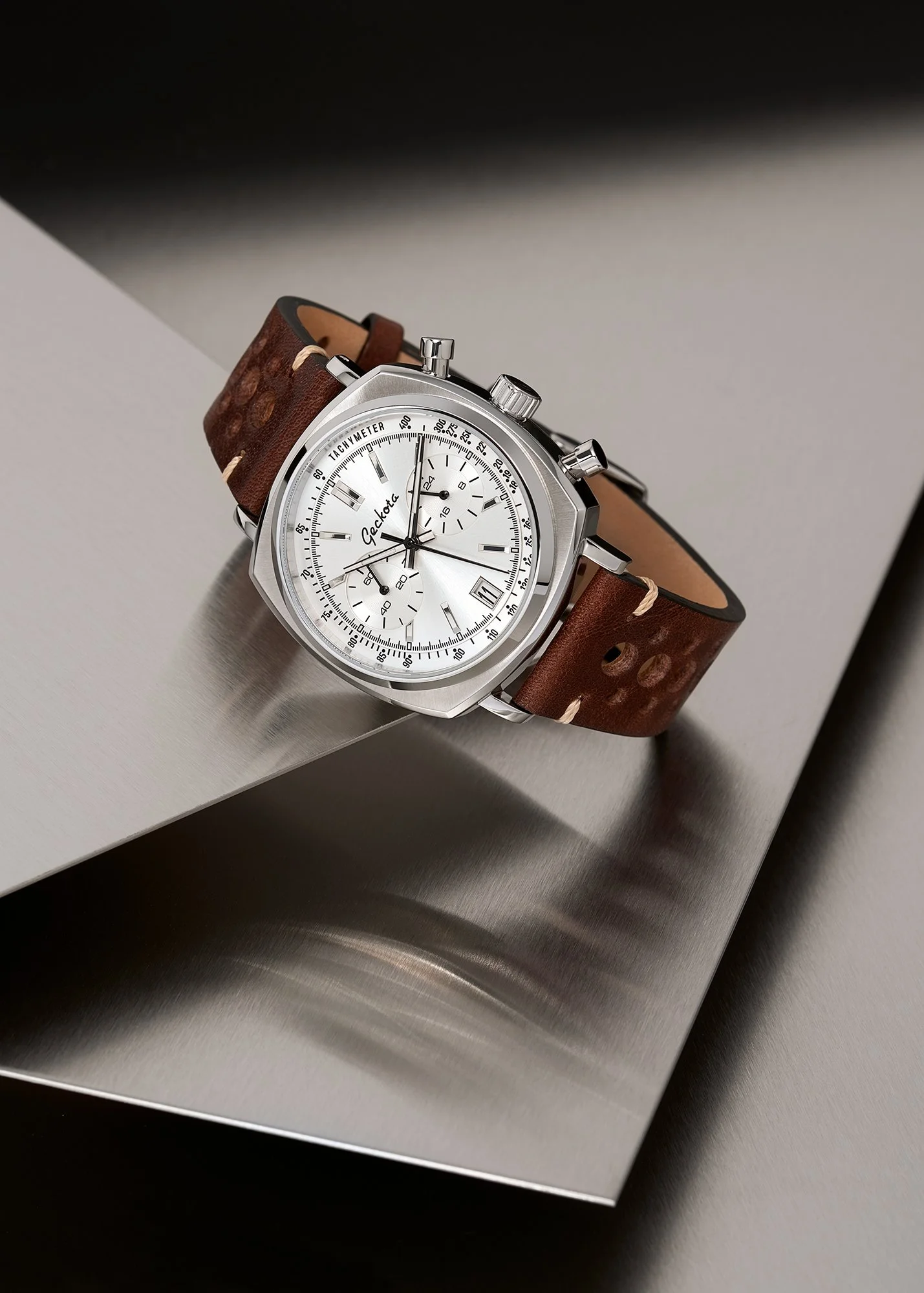Geckota Classic Chronotimer chronograph watch with stainless steel  background.