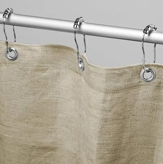This eco-friendly and non-toxic hemp shower curtain from Bean products is handmade in the US. Bean is a family-run business founded in 1987. It also makes linen and cotton shower curtains. These natural breathable materials prevent exposure to the to