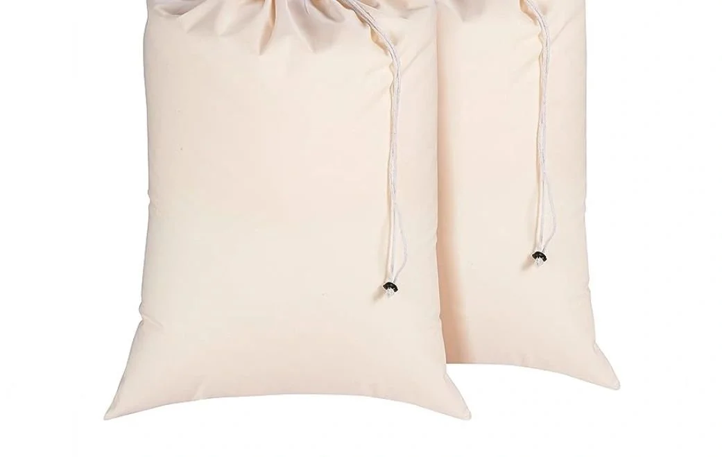 Cotton laundry bags are an easy way for students to schlepp their clothes to the laundry room and the cotton is non-toxice and eco-friendly. Stay away from synthetic bags. They're toxic and don't last as long. 