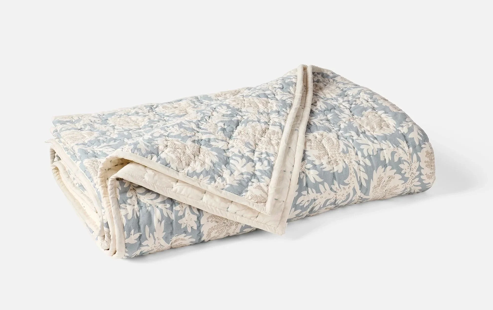This hand-stitched quilt from Coyuchi is made of 100 percent GOTS-certified organic cotton grown and woven in India. Both the shell and the batting interior are organic cotton. No synthetics here.