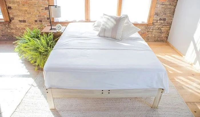 This delicious-looking comforter from Whisper Organics is GOTS-certified 100 percent organic cotton from India. Even the stuffing is organic cotton. No toxic poly here.  It's a soft ivory color. 