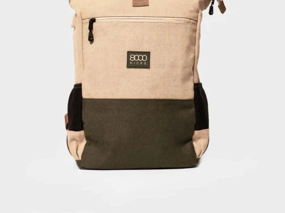 8000 Kicks' hemp backpacks are made from industrial hemp, which has been used since 8000 BC. Its properties include being anti-bacterial, needing no fertilizers or pesticides to grow, and it cleans and restores nutrients in the soil. 