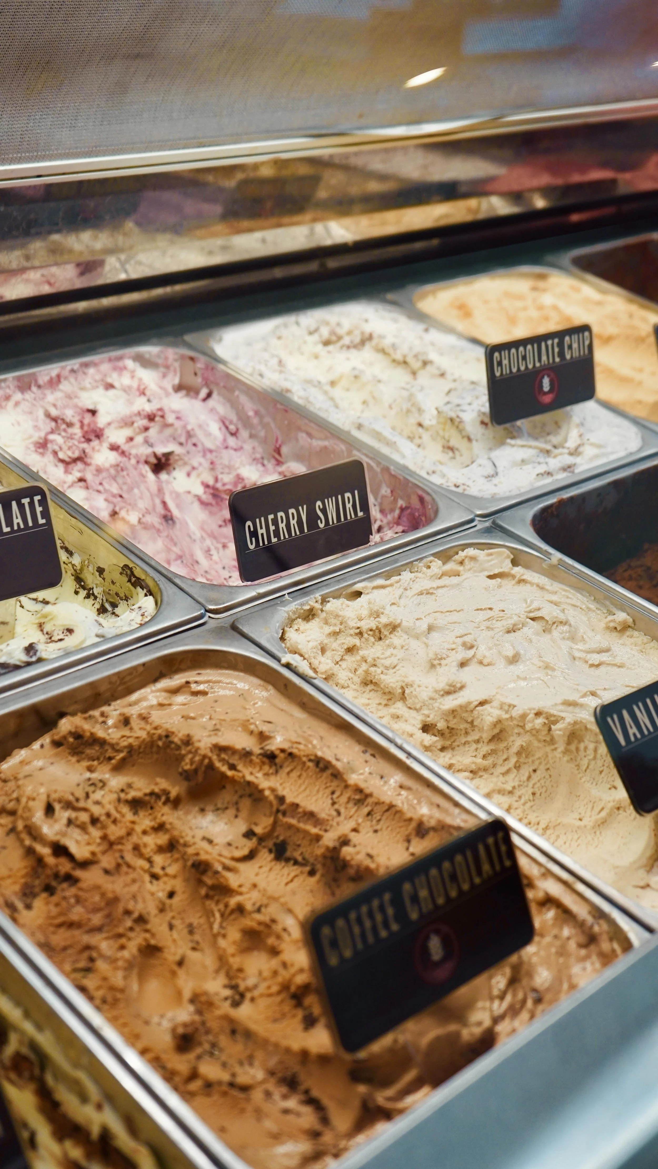 Ice cream display featuring a variety of handcrafted flavors.