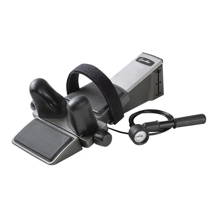 An automated foot pedal blood pressure monitor with black cuffs, a pressure gauge, and electronic arm cuff holder.