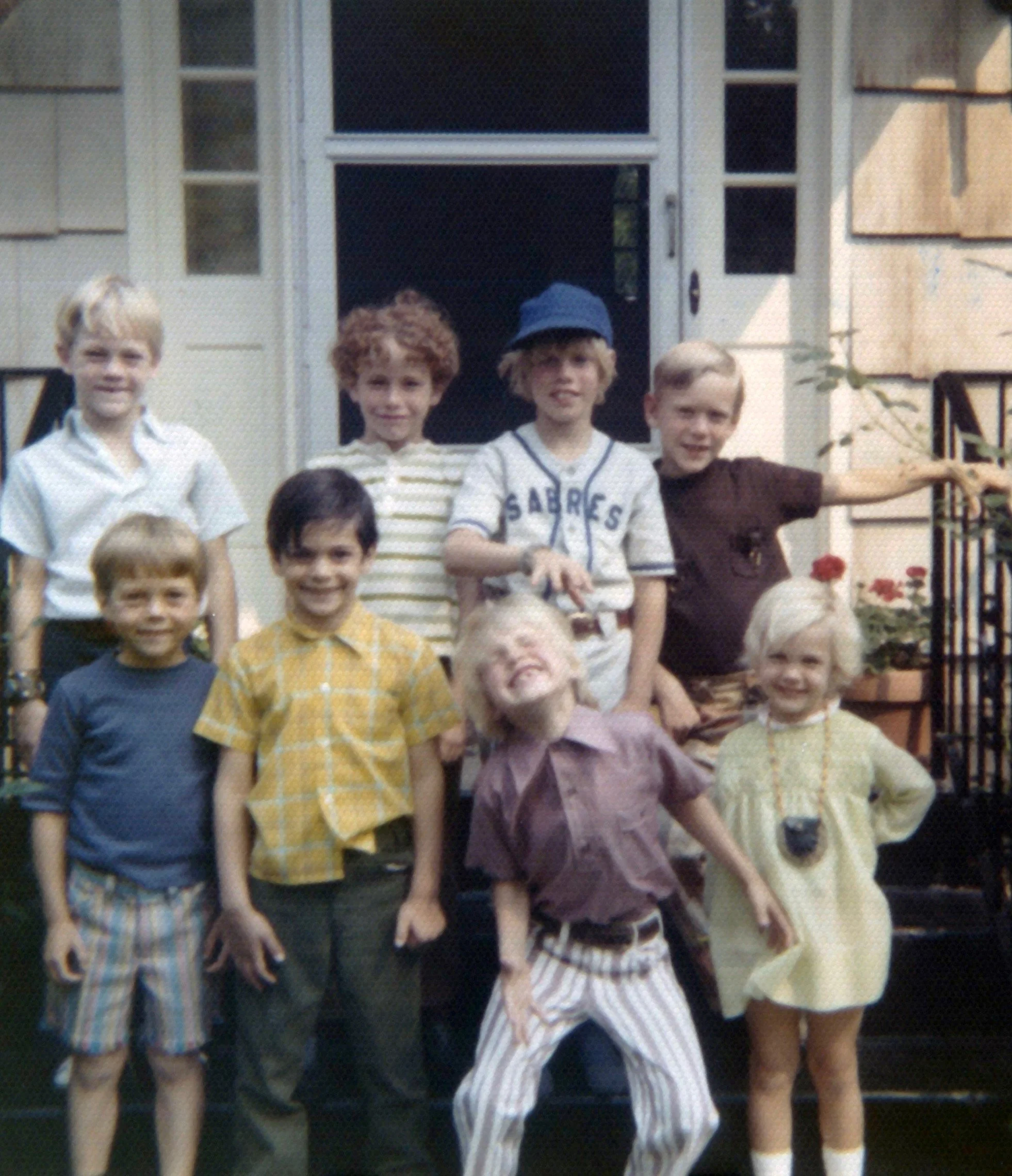 Dave’s 7th birthday at 16 Colony Road. Top row, from left: Mark Myers, Danny Mahoney, me (in baseball uniform), Greg Frock. Bottom row, from left: Mike Quint, Unidentified, David, Kathy. Westport, CT, June 1972