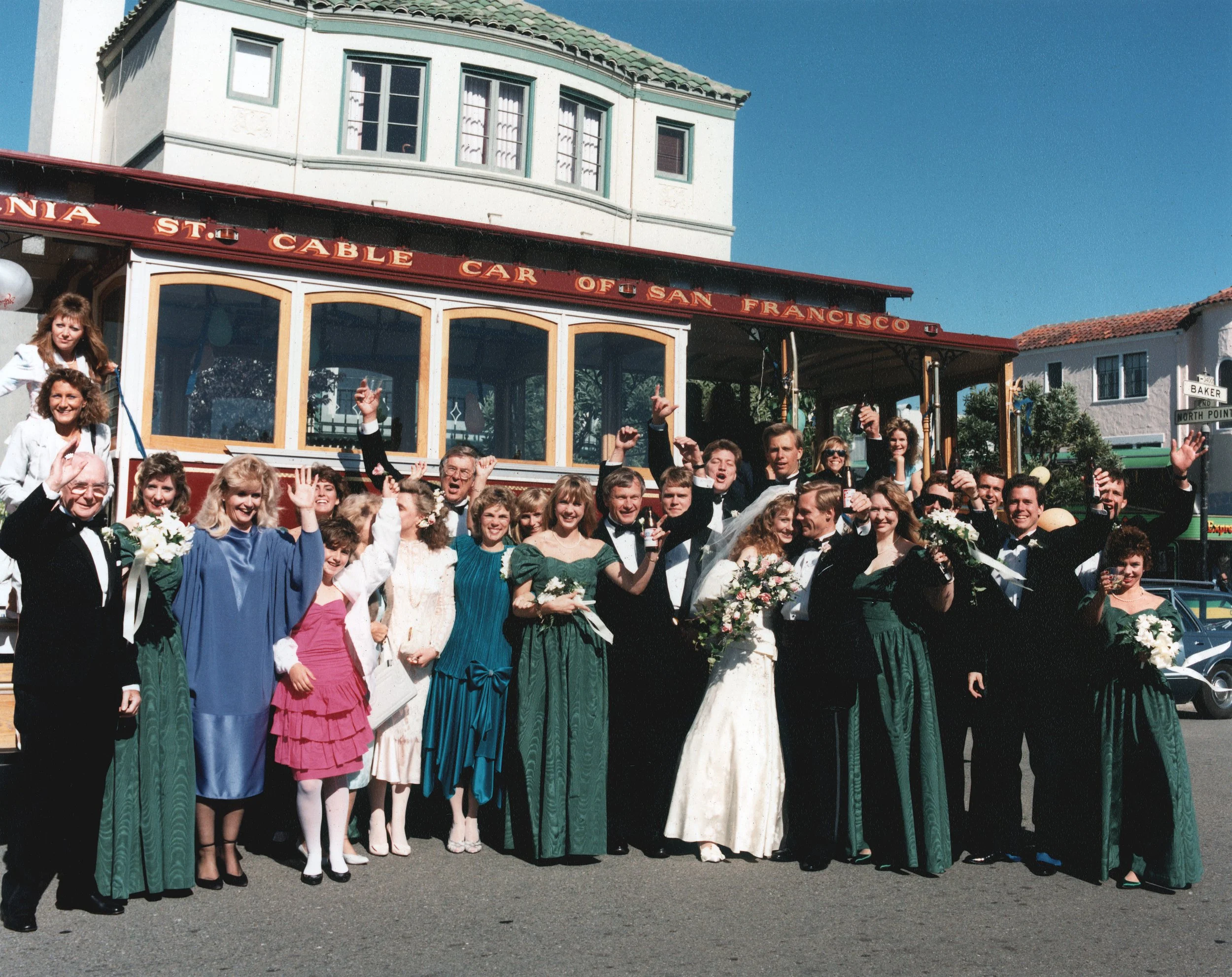 Wedding party and relatives on a cable car in the Marina District on the way to the reception. San Francisco, CA, May 29, 1988