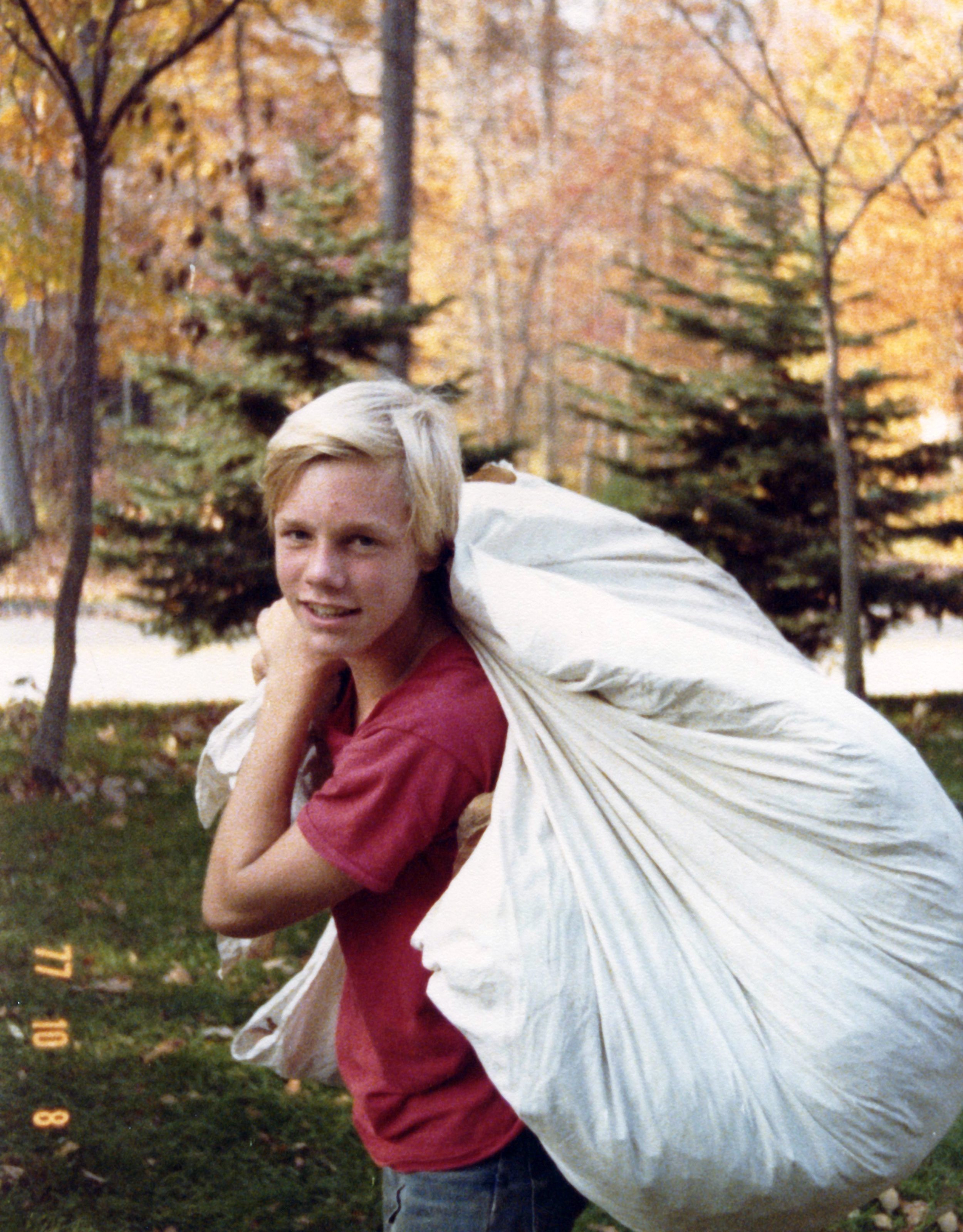 Me hauling leaves at 16 Colony Road. Westport, CT, October 1977