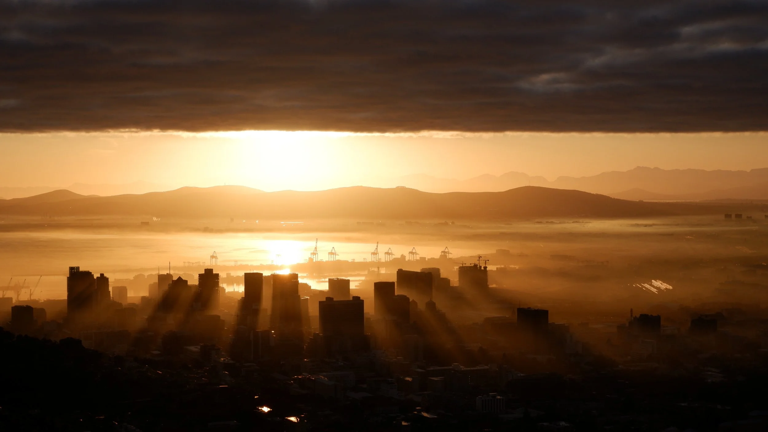 Misty sunrise over Cape Town city