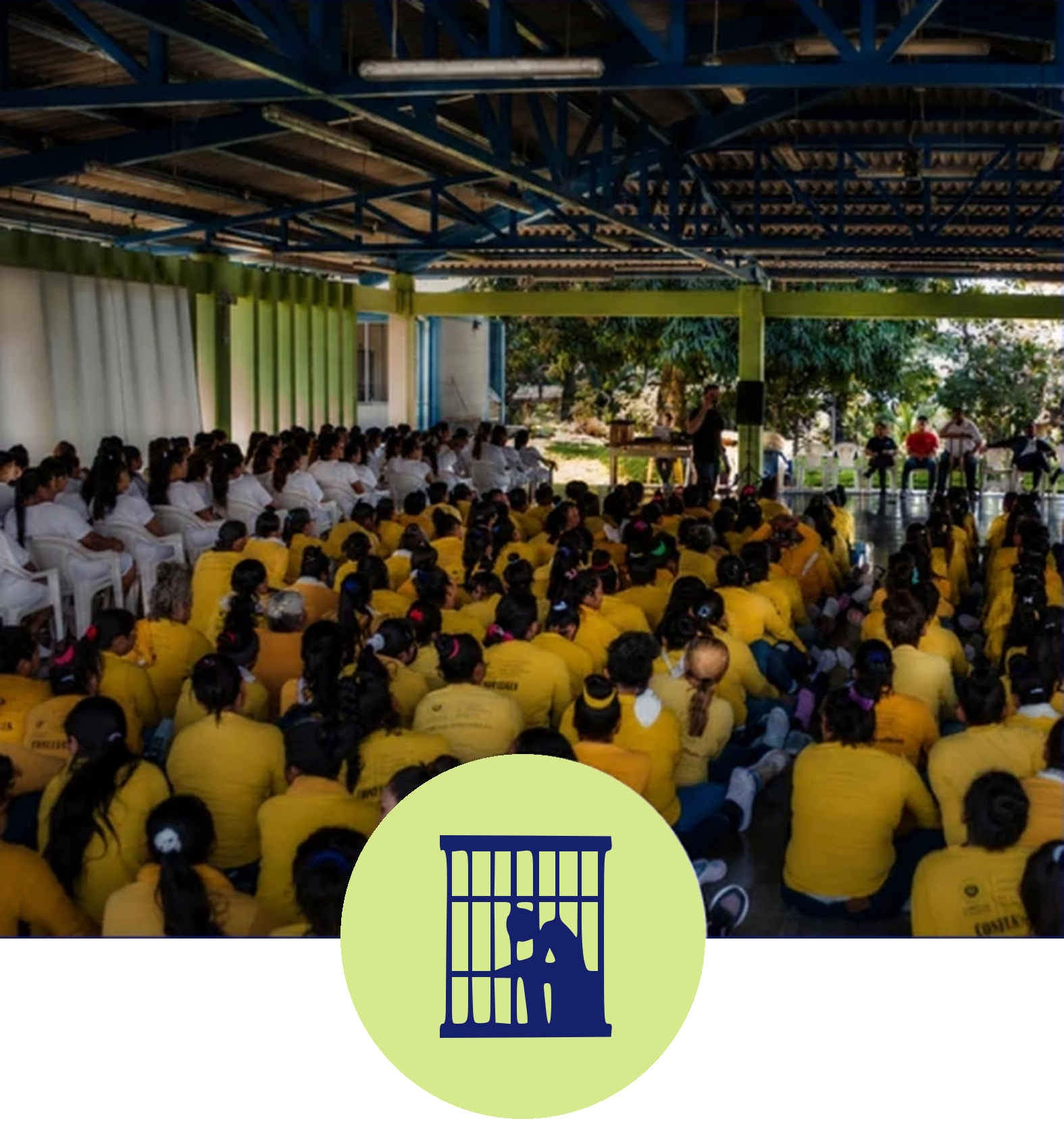 Prisoners sit in rows