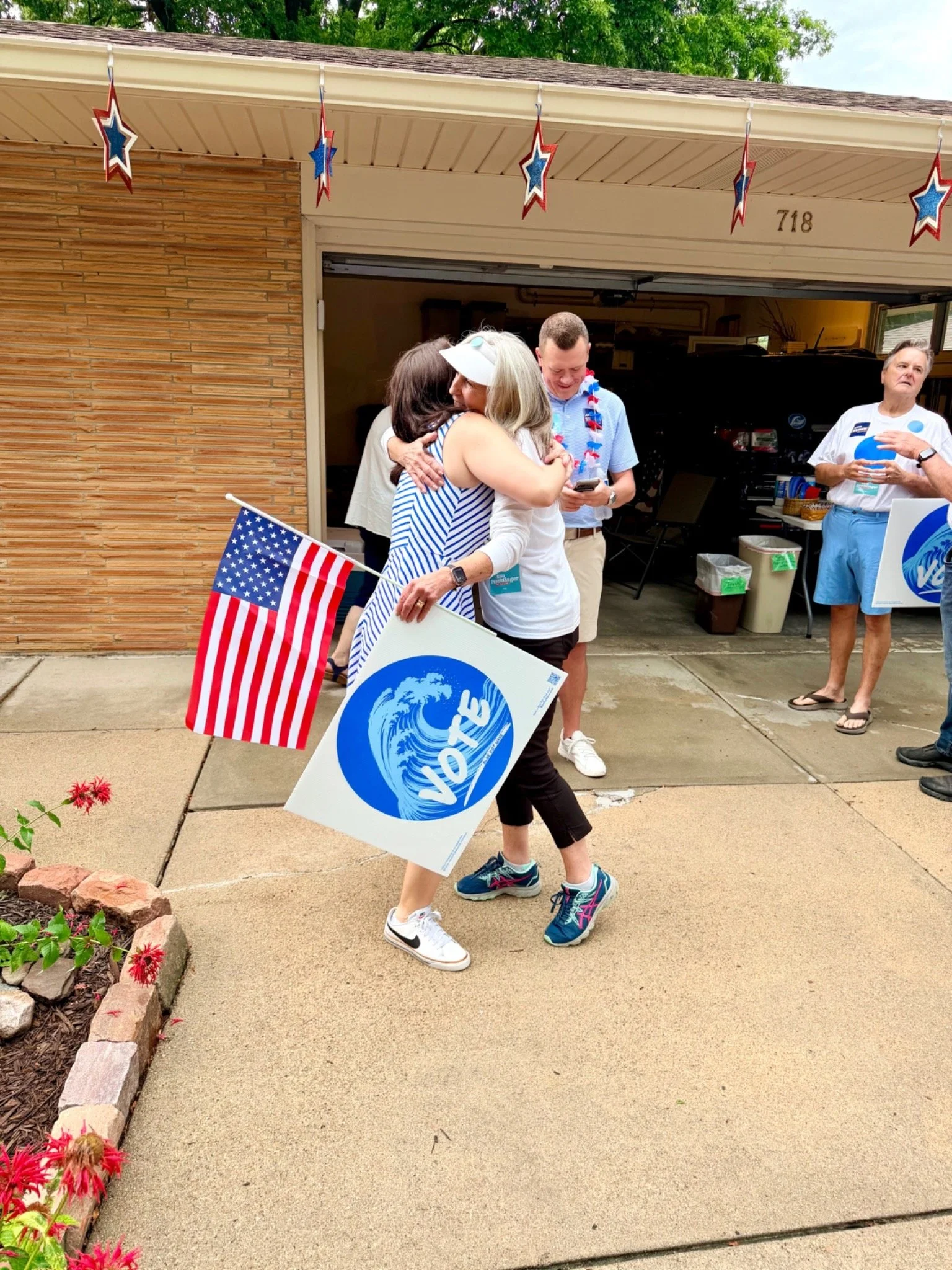 blue-dot-wave-denise-powell-parade-community-hug-vote-sign-03.jpg