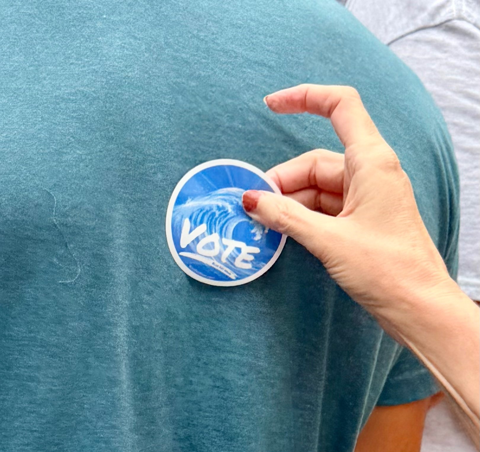 blue-dot-wave-vote-sticker-closeup-community-parade-11.jpg
