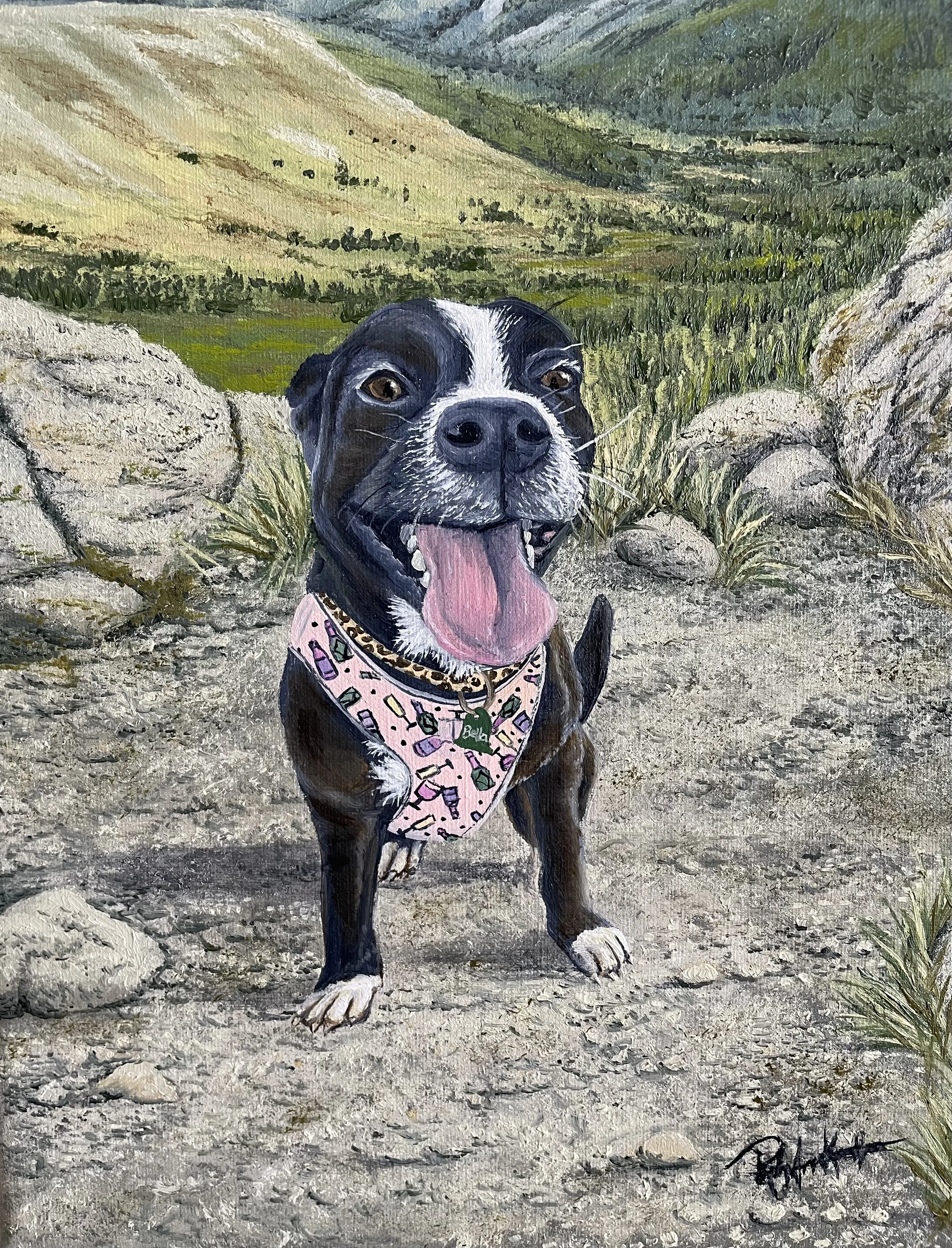 Painting of a happy black and white Boston terrier dog with its tongue out, wearing a pink bandana with colorful candies, standing outdoors on a rocky trail with green hills and mountains in the background.