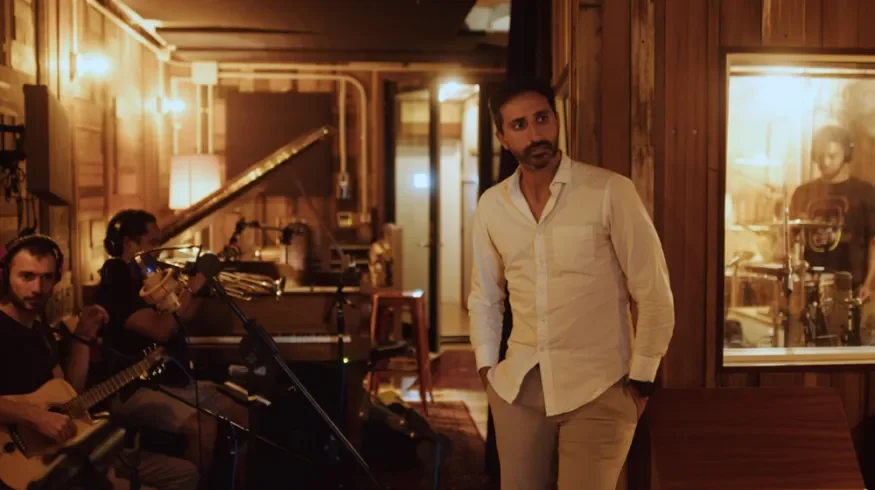 David Lizmi during a recording session with musicians in a New York studio