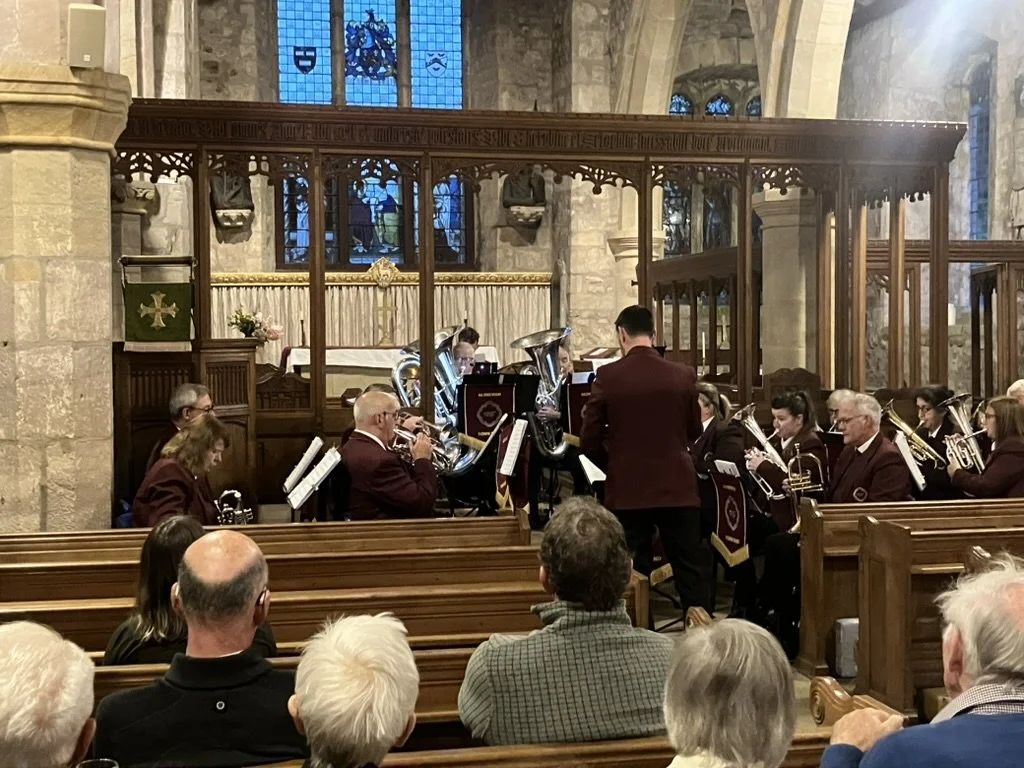 £250 raised at an intimate brass band concert